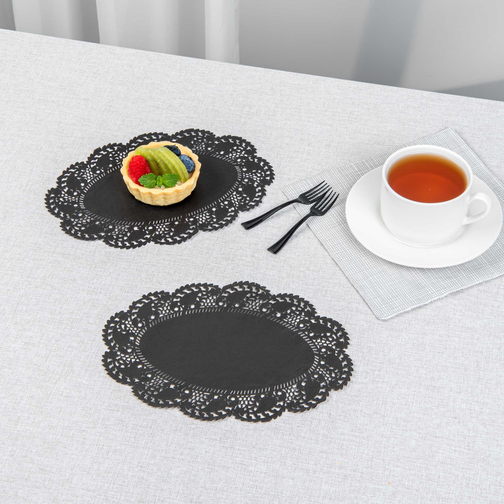 Pastry Tek Oval Black Paper Doilies - Lace - 9" x 6 1/2" - 4000 count box