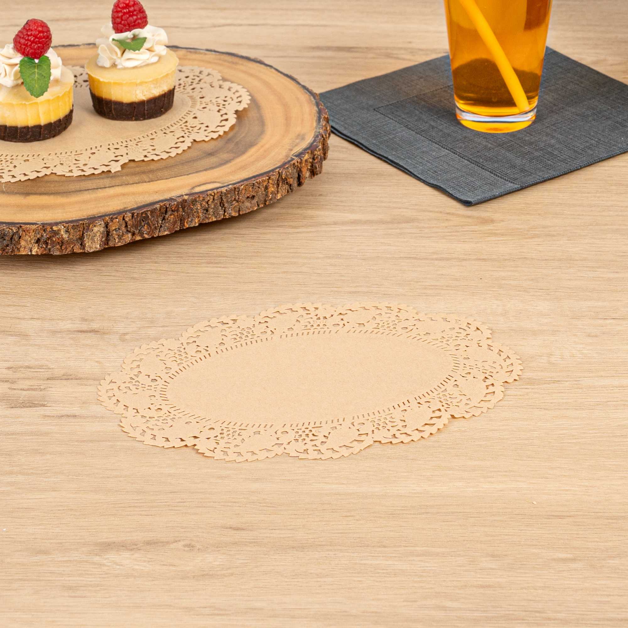 Pastry Tek Oval Kraft Paper Doilies - Lace - 9" x 6 1/2" - 100 count box