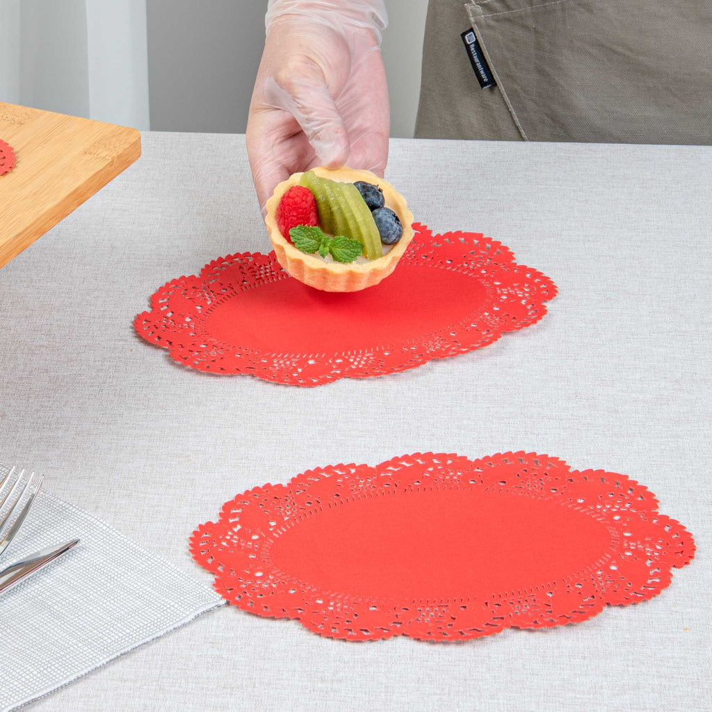 Pastry Tek Oval Red Paper Doilies - Lace - 9" x 6 1/2" - 100 count box