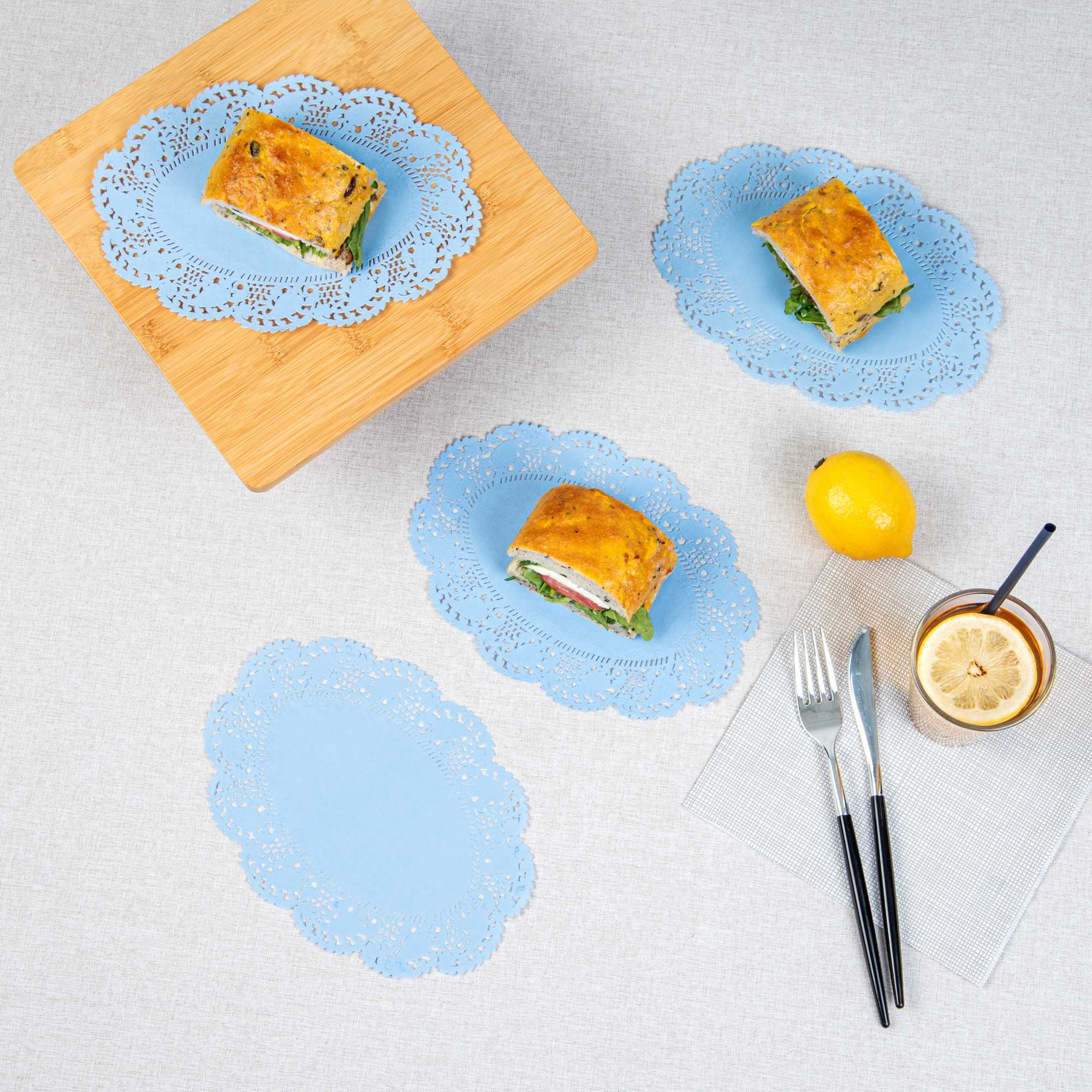 Pastry Tek Oval Sky Blue Paper Doilies - Lace - 9" x 6 1/2" - 100 count box