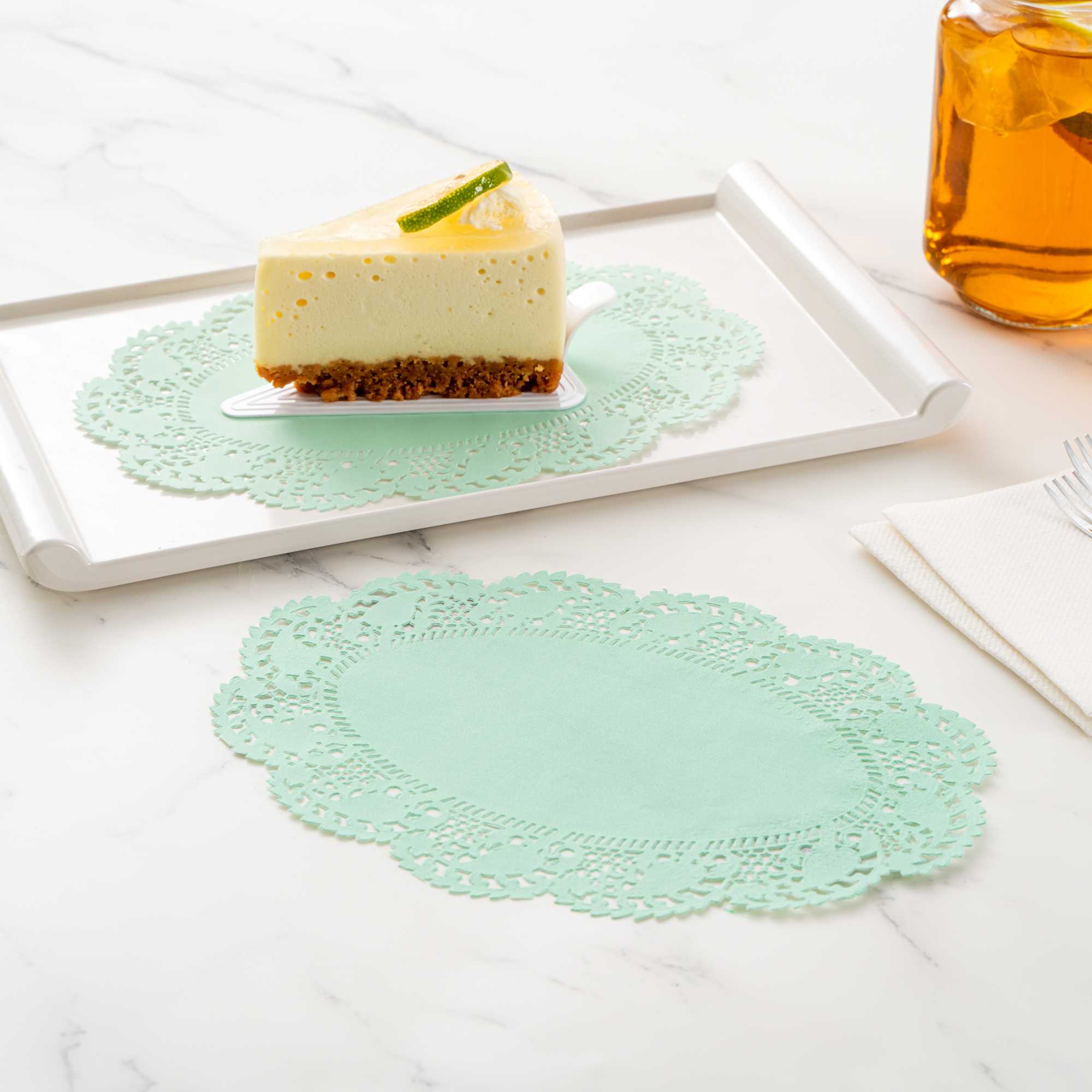 Pastry Tek Oval Teal Paper Doilies - Lace - 9" x 6 1/2" - 4000 count box