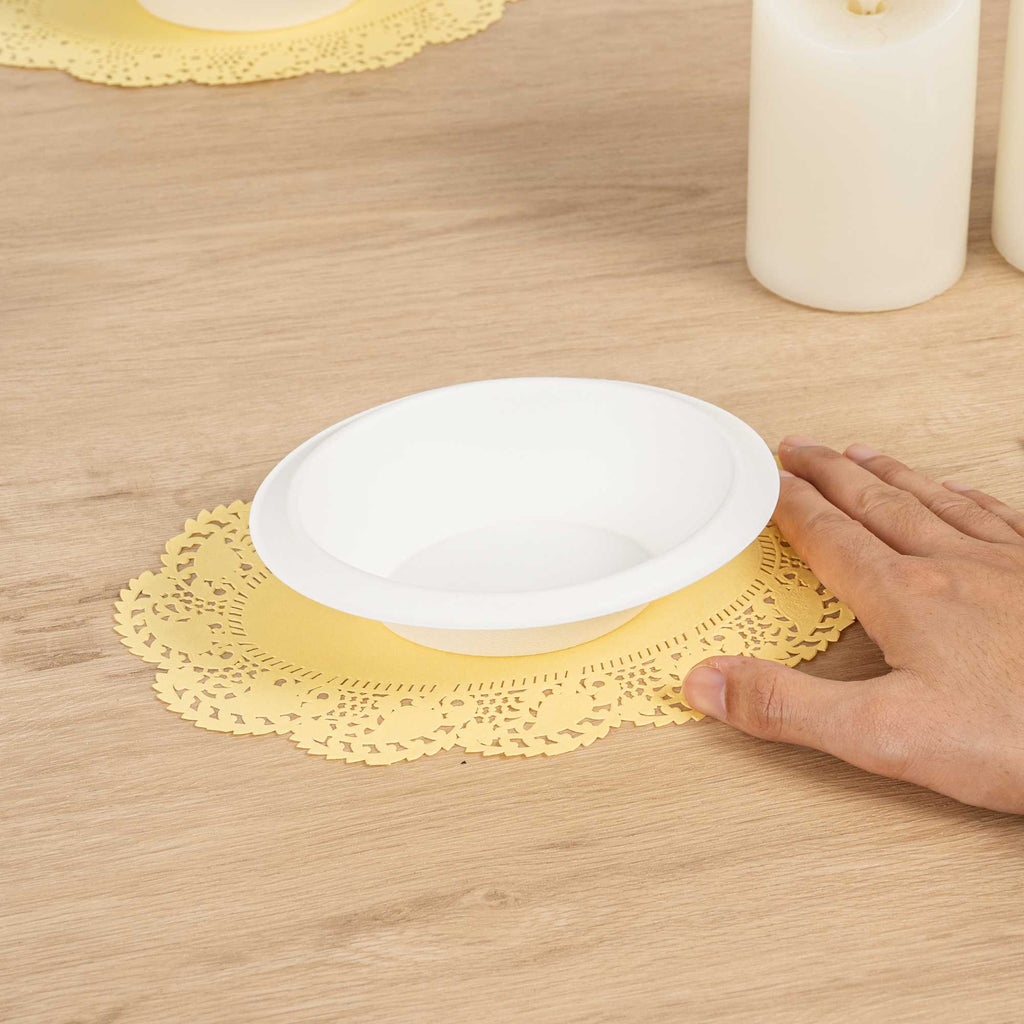 Pastry Tek Oval Yellow Paper Doilies - Lace - 9" x 6 1/2" - 100 count box