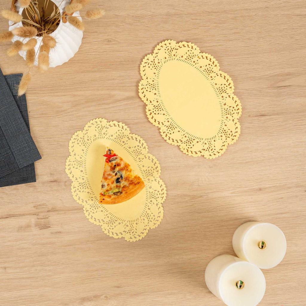 Pastry Tek Oval Yellow Paper Doilies - Lace - 9" x 6 1/2" - 100 count box