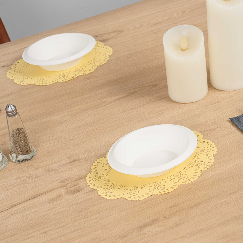 Pastry Tek Oval Yellow Paper Doilies - Lace - 9" x 6 1/2" - 4000 count box