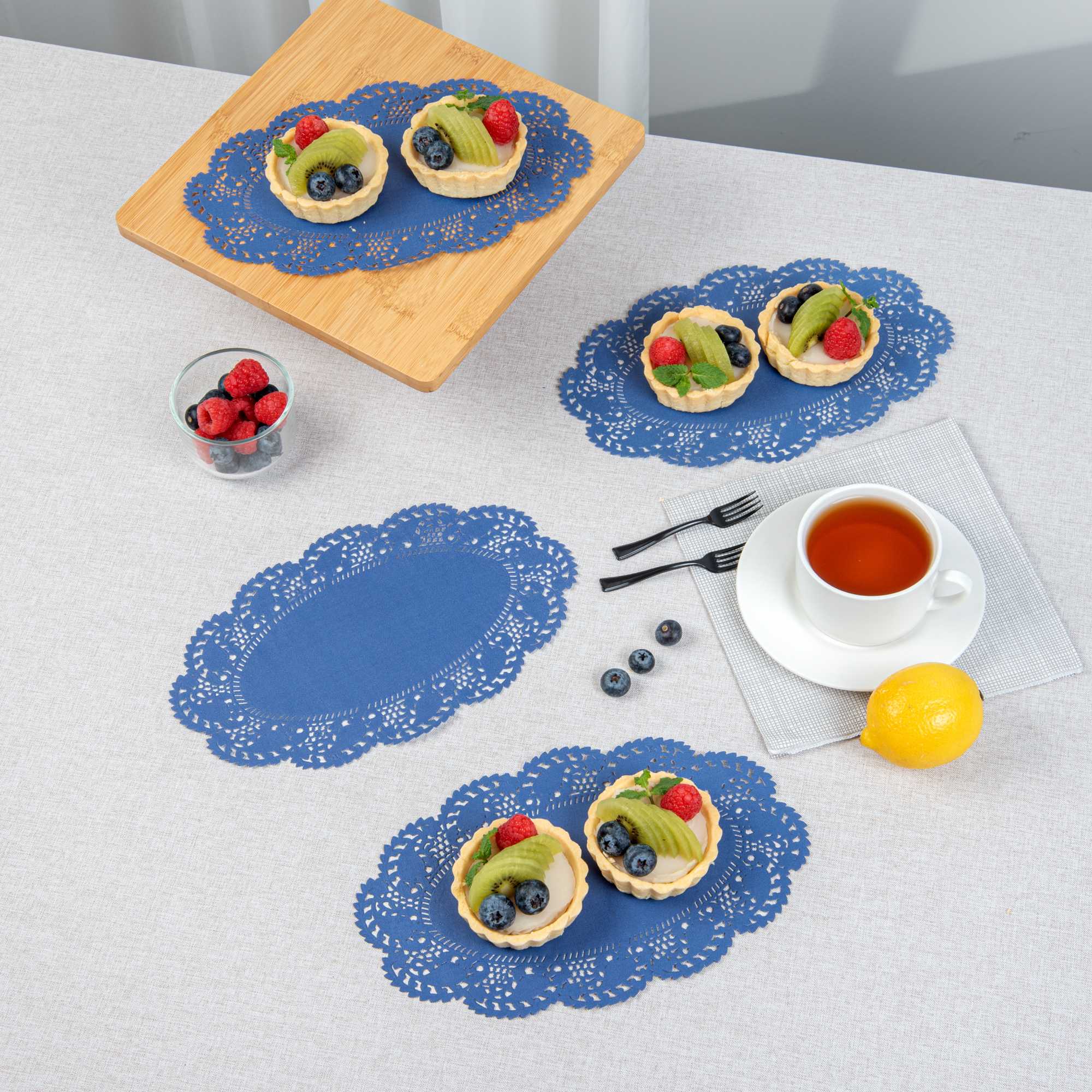 Pastry Tek Oval Navy Blue Paper Doilies - Lace - 10 1/2" x 6 1/2" - 4000 count box