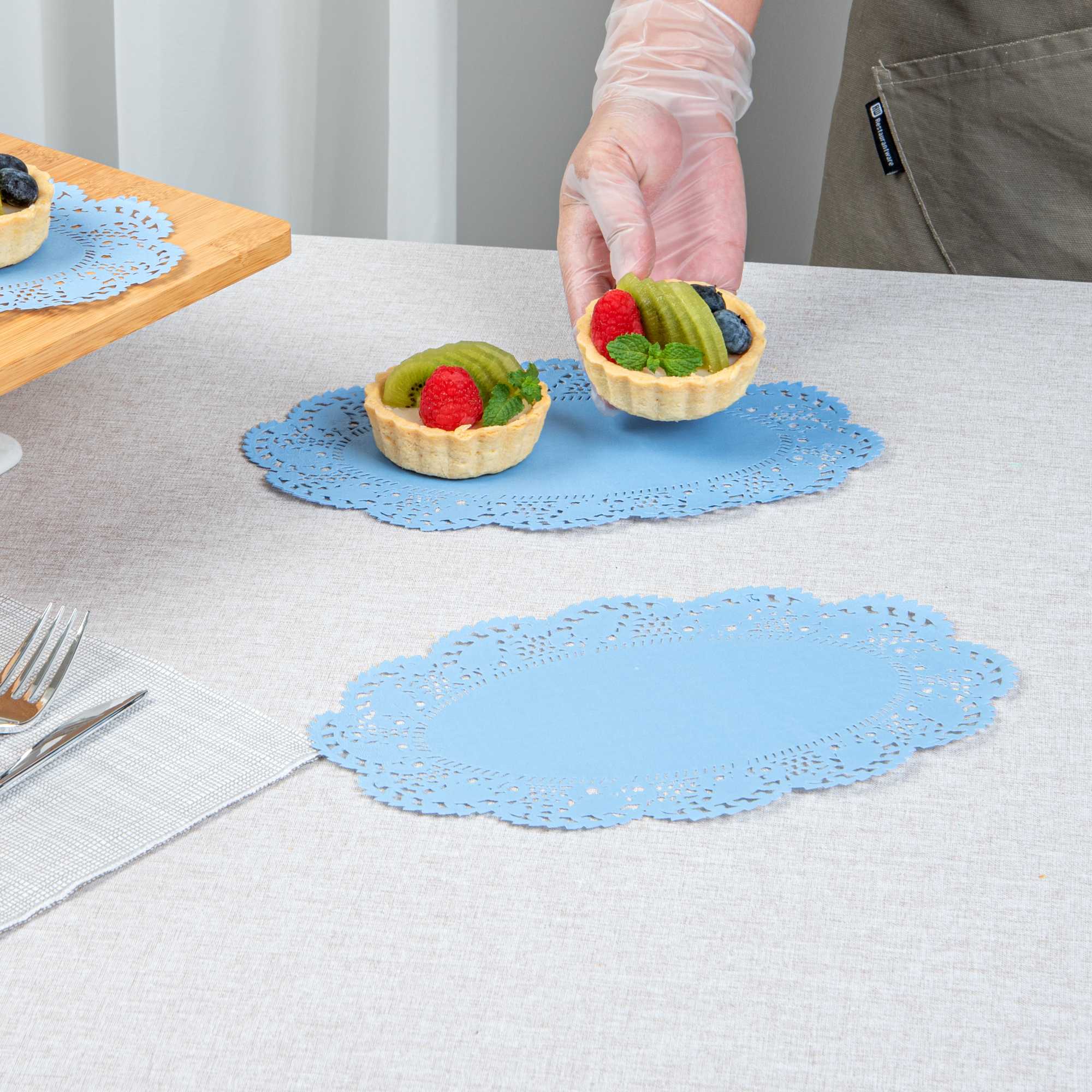 Pastry Tek Oval Sky Blue Paper Doilies - Lace - 10 1/2" x 6 1/2" - 100 count box
