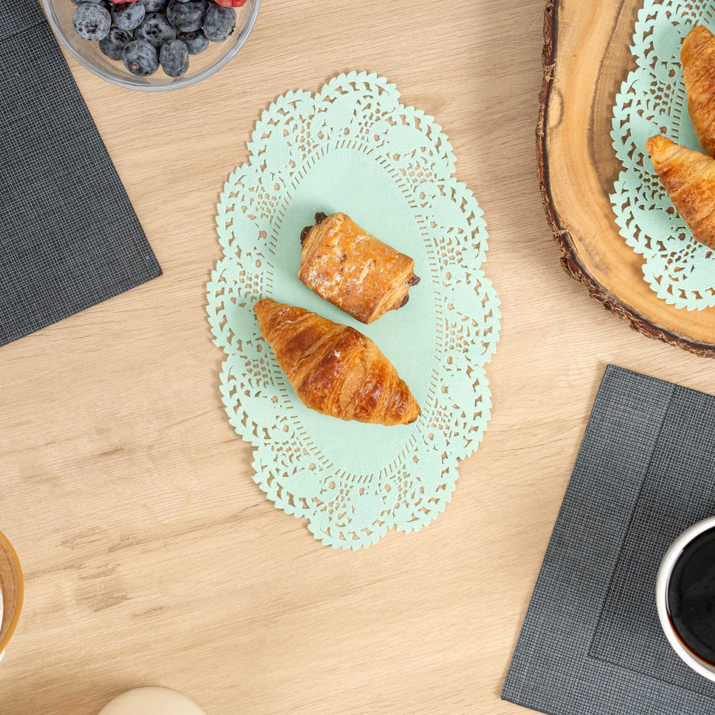 Pastry Tek Oval Teal Paper Doilies - Lace - 10 1/2" x 6 1/2" - 100 count box