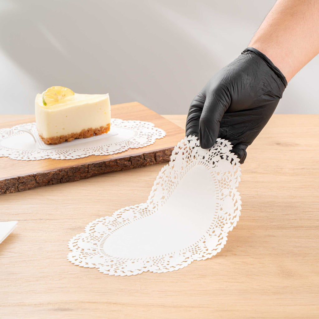Pastry Tek Oval White Paper Doilies - Lace - 10 1/2" x 6 1/2" - 100 count box