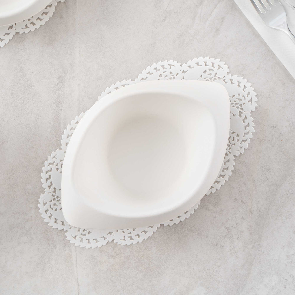 Pastry Tek Oval White Paper Doilies - Lace - 10 1/2" x 6 1/2" - 100 count box