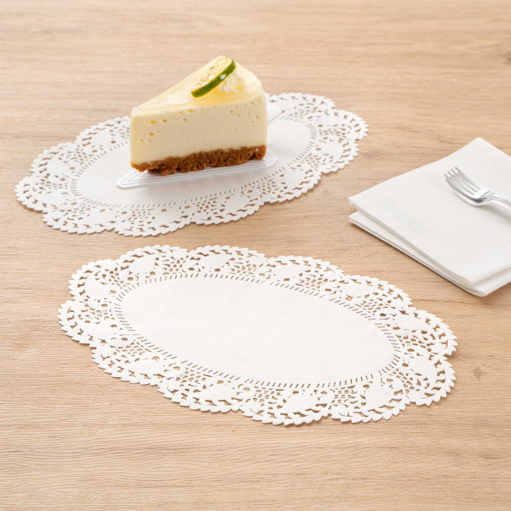 Pastry Tek Oval White Paper Doilies - Lace - 10 1/2" x 6 1/2" - 4000 count box