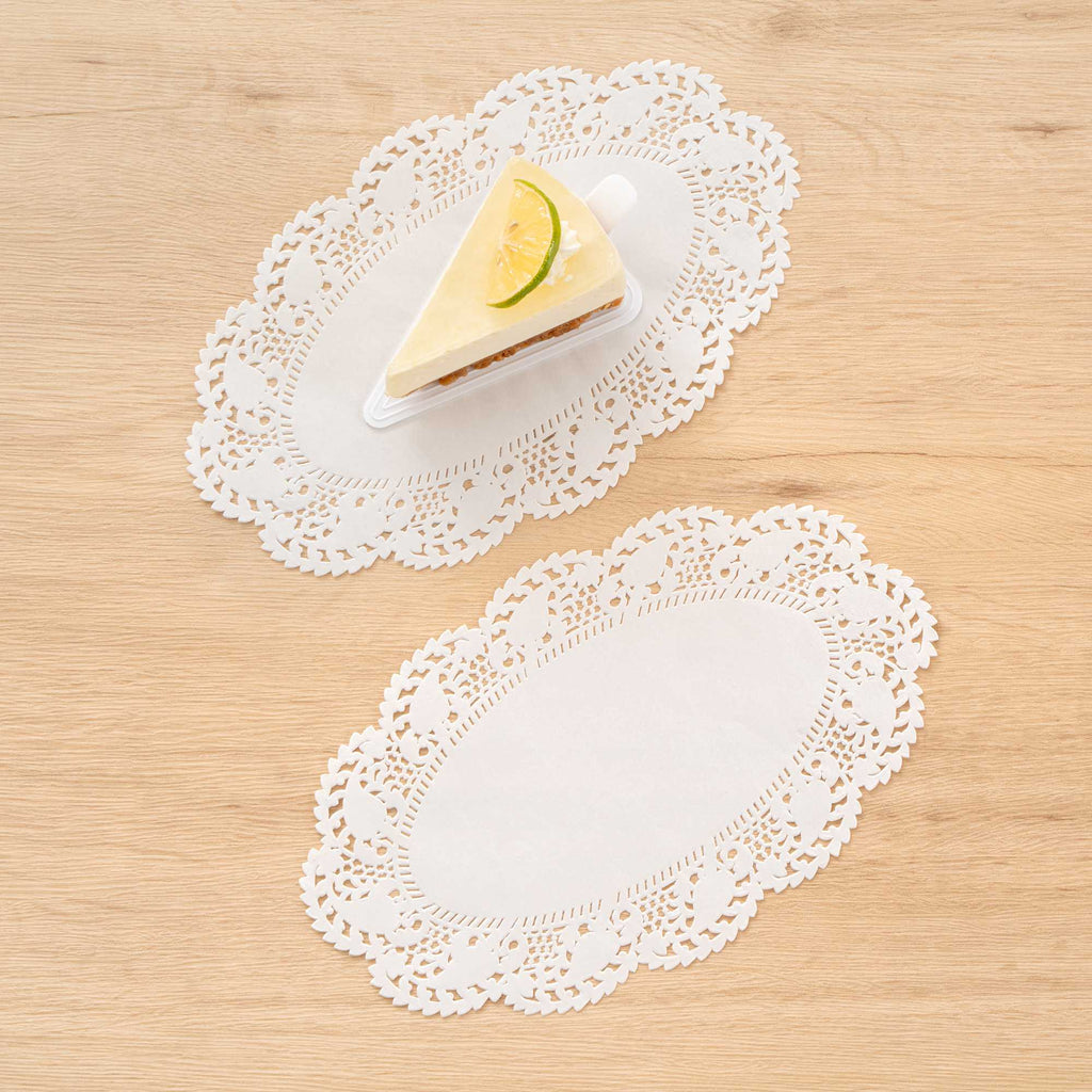 Pastry Tek Oval White Paper Doilies - Lace - 10 1/2" x 6 1/2" - 4000 count box