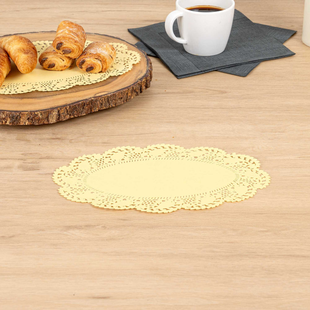 Pastry Tek Oval Yellow Paper Doilies - Lace - 10 1/2" x 6 1/2" - 100 count box