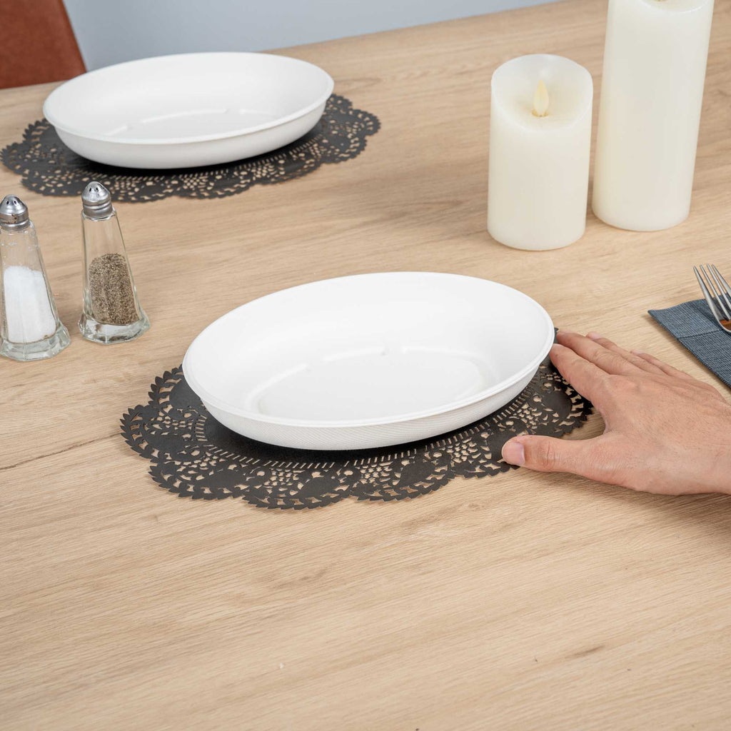 Pastry Tek Oval Black Paper Doilies - Lace - 12 1/2" x 8 1/2" - 100 count box