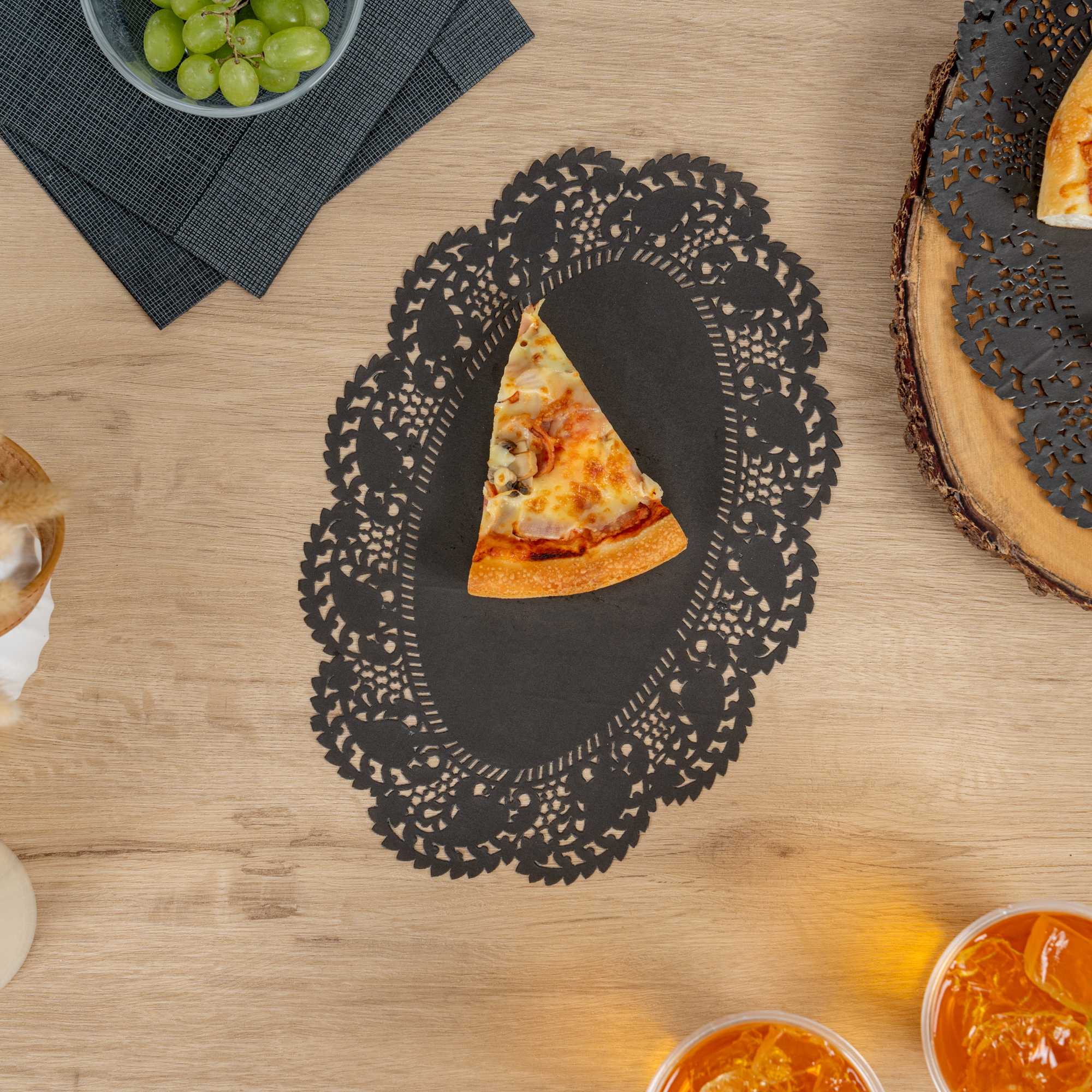 Pastry Tek Oval Black Paper Doilies - Lace - 12 1/2" x 8 1/2" - 4000 count box