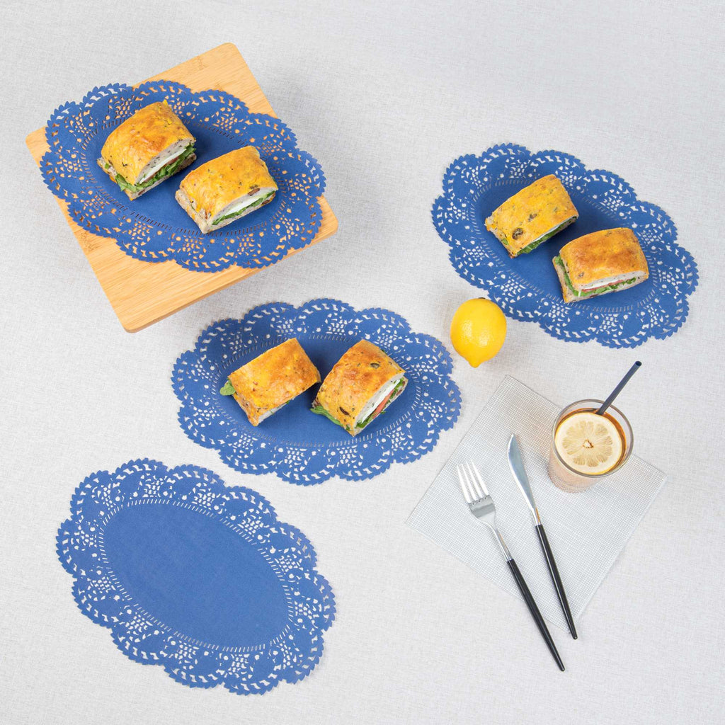 Pastry Tek Oval Navy Blue Paper Doilies - Lace - 12 1/2" x 8 1/2" - 100 count box
