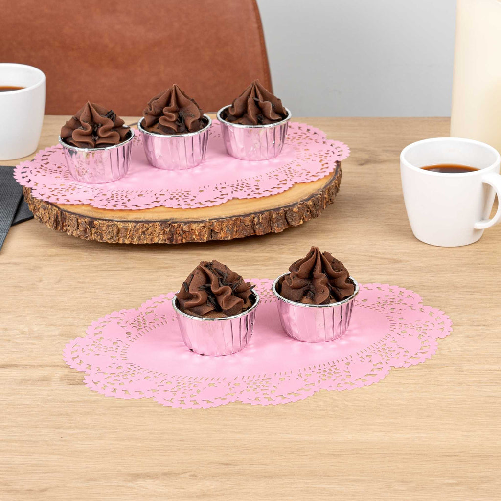Pastry Tek Oval Pink Paper Doilies - Lace - 12 1/2" x 8 1/2" - 100 count box