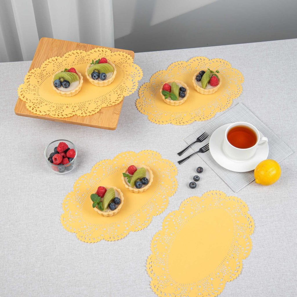 Pastry Tek Oval Orange Paper Doilies - Lace - 12 1/2" x 8 1/2" - 100 count box