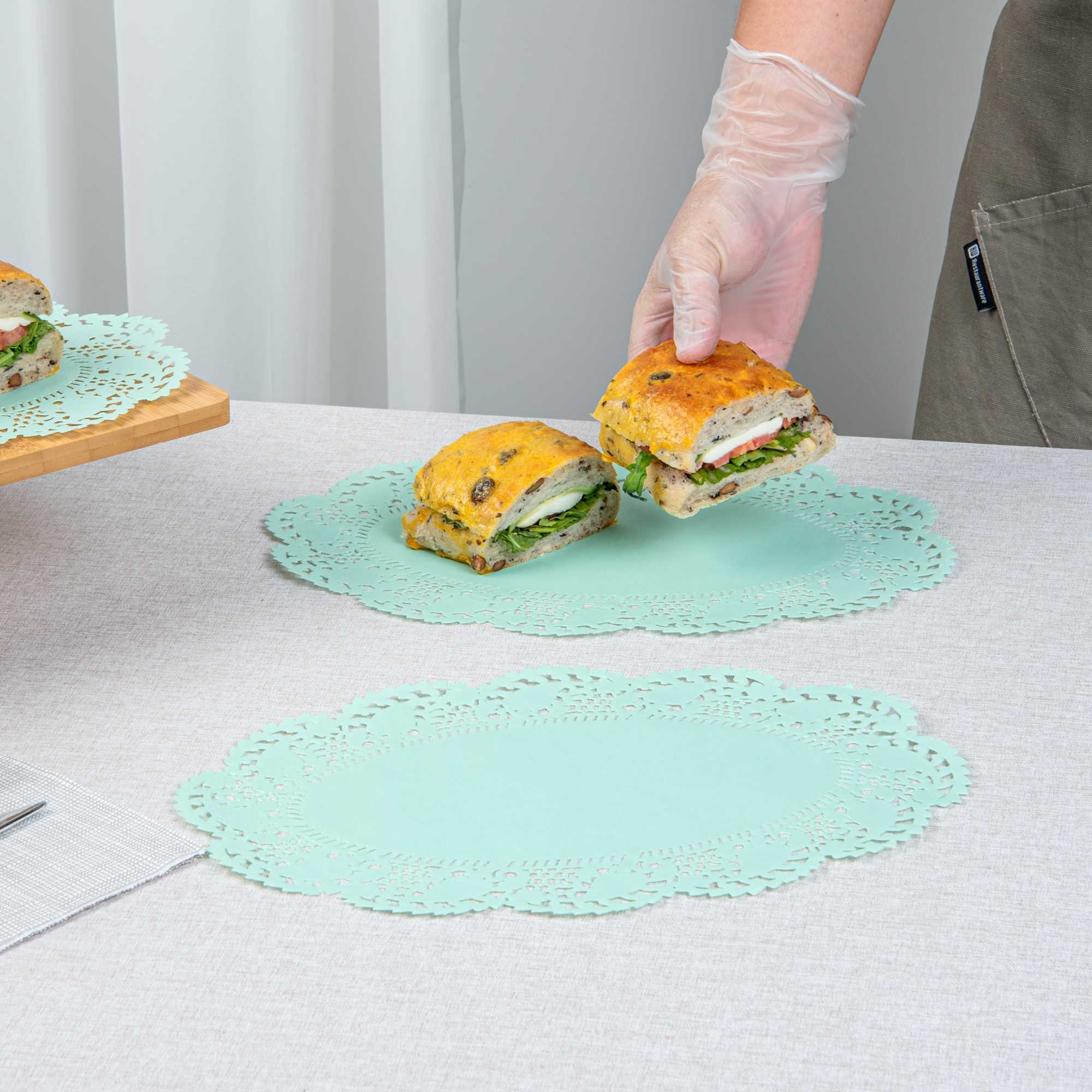 Pastry Tek Oval Teal Paper Doilies - Lace - 12 1/2" x 8 1/2" - 4000 count box