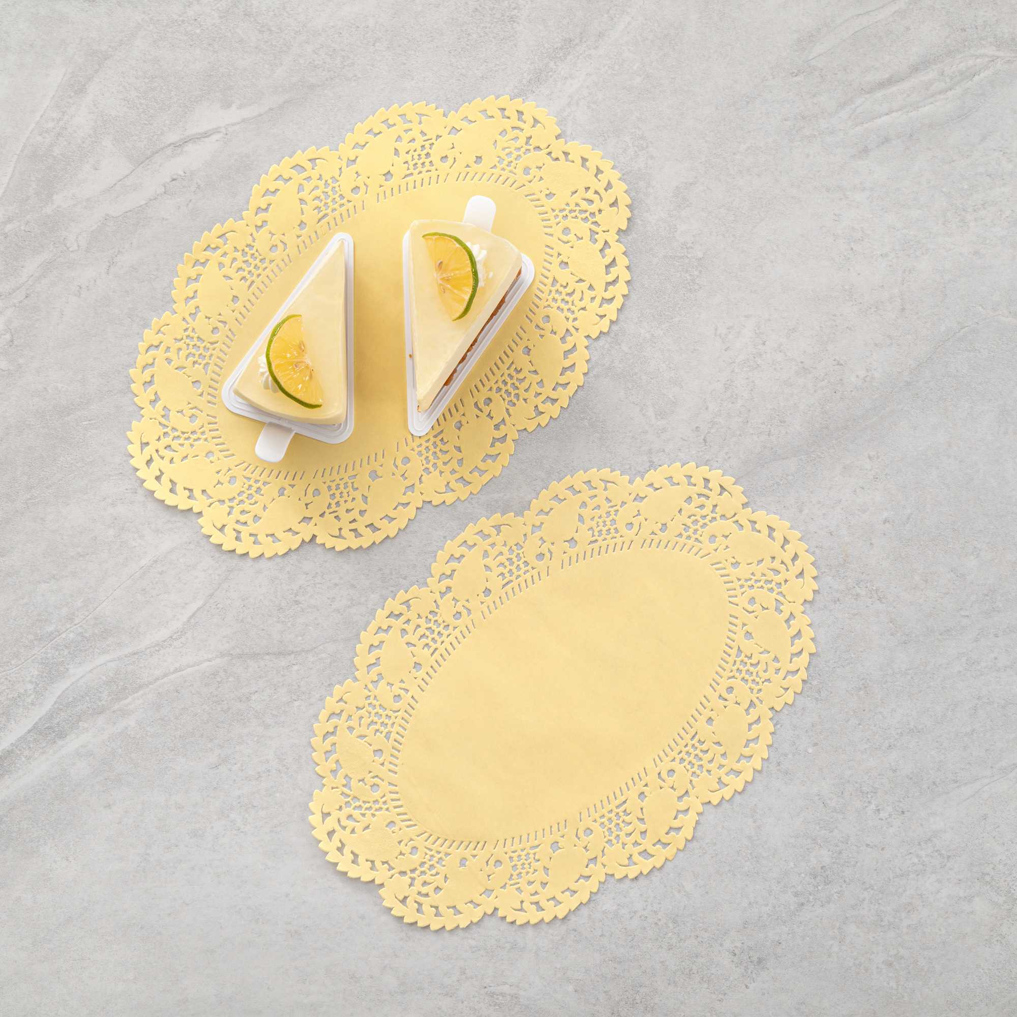 Pastry Tek Oval Yellow Paper Doilies - Lace - 12 1/2" x 8 1/2" - 100 count box