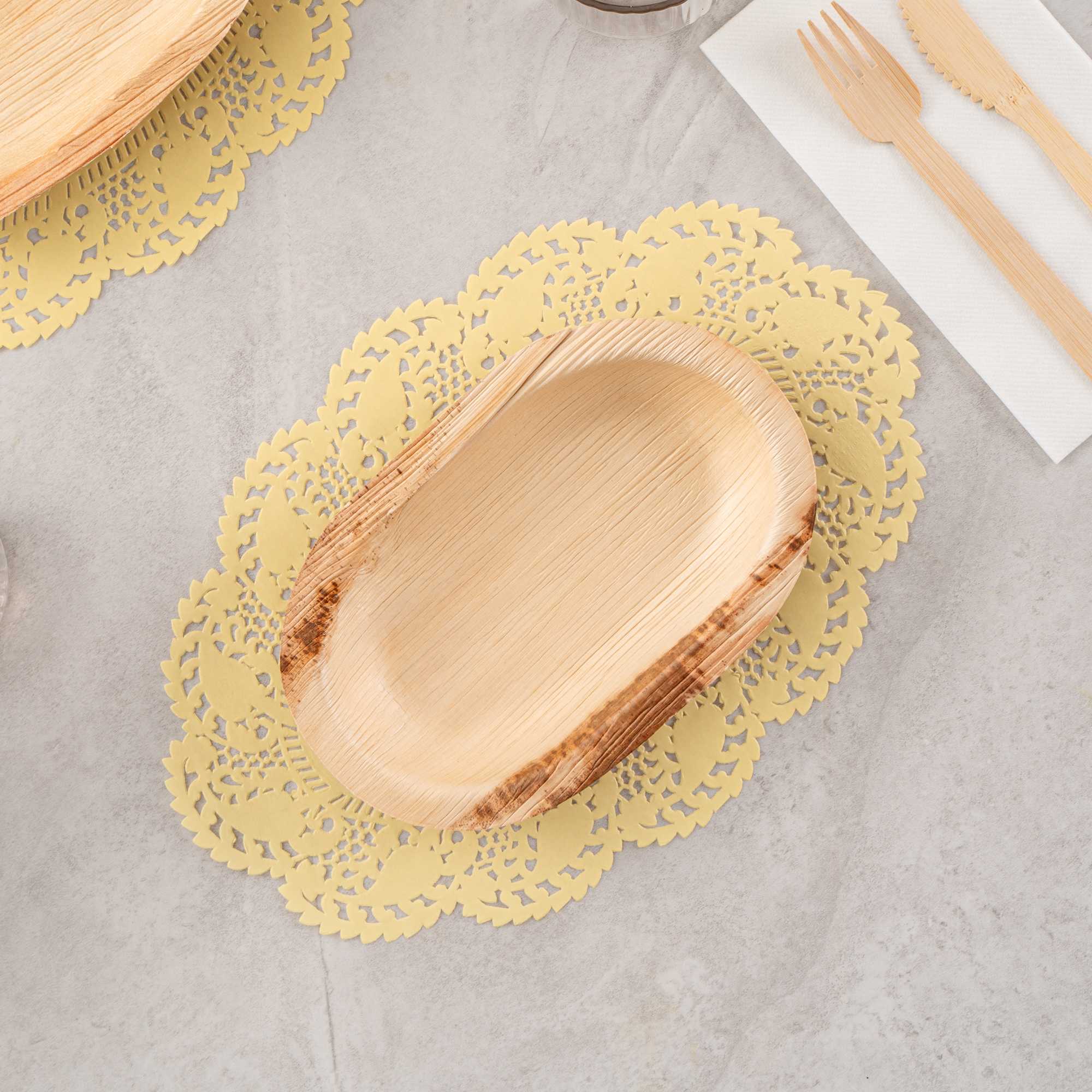 Pastry Tek Oval Yellow Paper Doilies - Lace - 12 1/2" x 8 1/2" - 100 count box