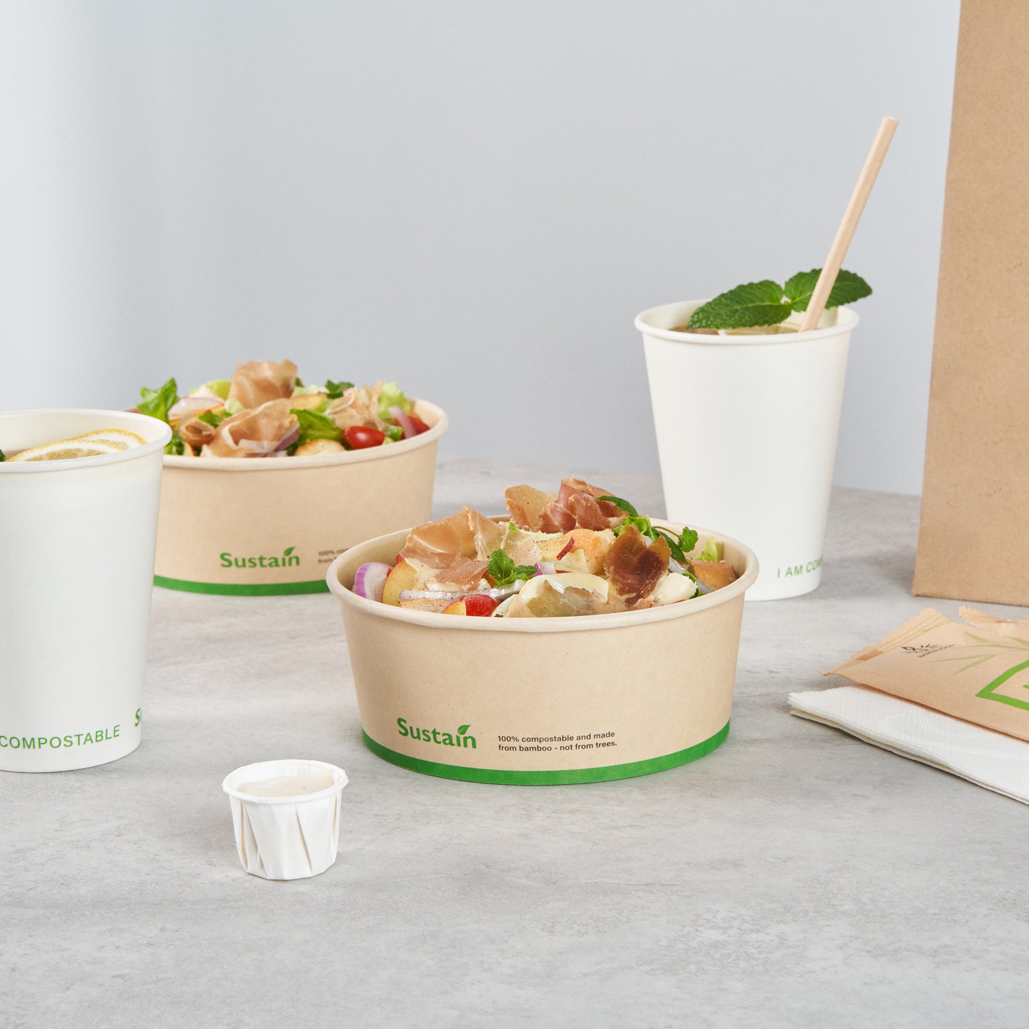 Sustain 25 oz Round Bamboo Paper Salad Container - with PLA Lining, Compostable - 6" x 6" x 2 1/2" - 200 count box