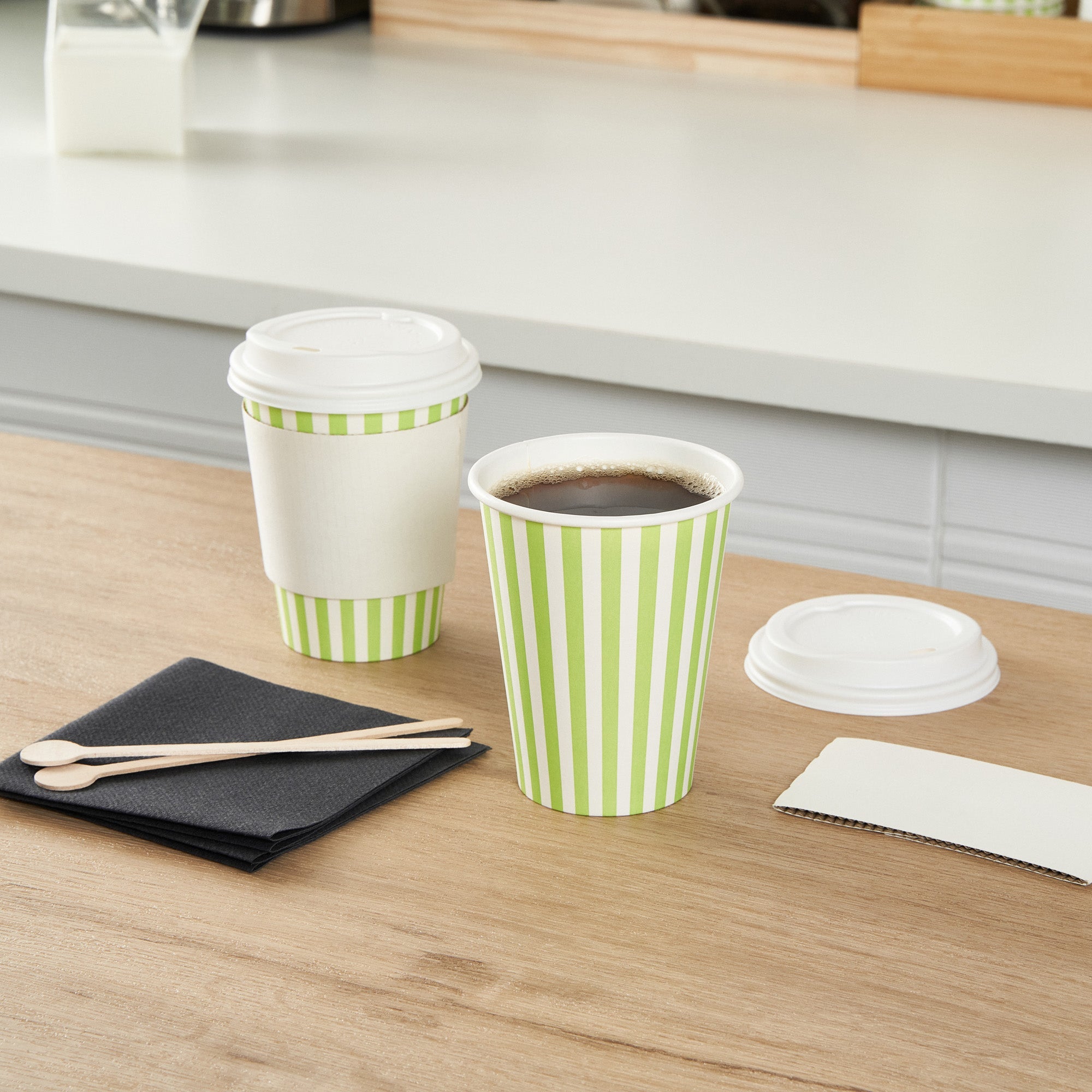 Restpresso 12 oz Green and White Stripe Paper Single Wall Coffee Cup - with White Lid - 3 1/2"x 3 1/2"x 4 3/4" - 20 count box