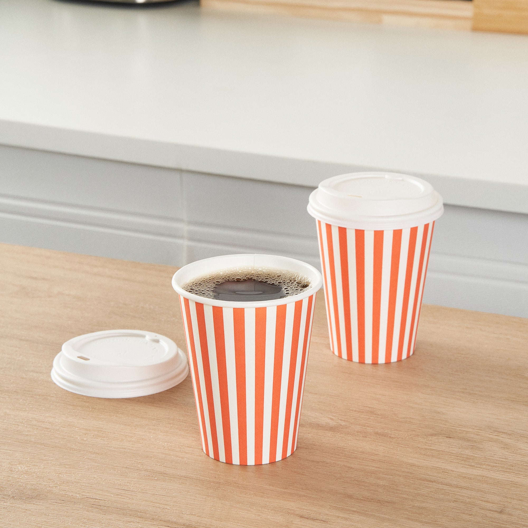Restpresso 12 oz Orange and White Stripe Paper Single Wall Coffee Cup - with White Lid - 3 1/2"x 3 1/2"x 4 3/4" - 400 count box