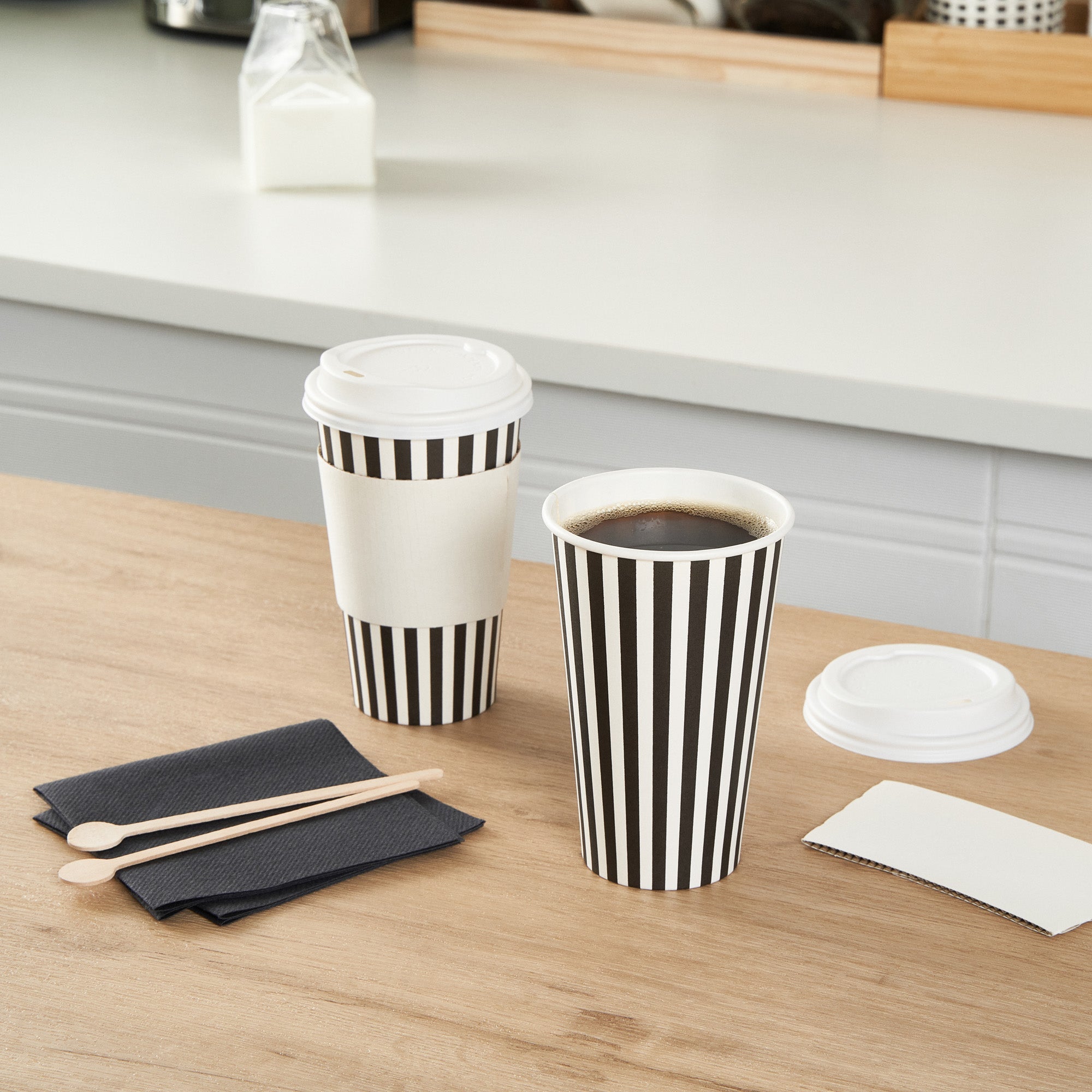 Restpresso 16 oz Black and White Stripe Paper Single Wall Coffee Cup - with White Lid - 3 1/2"x 3 1/2"x 5 3/4" - 20 count box