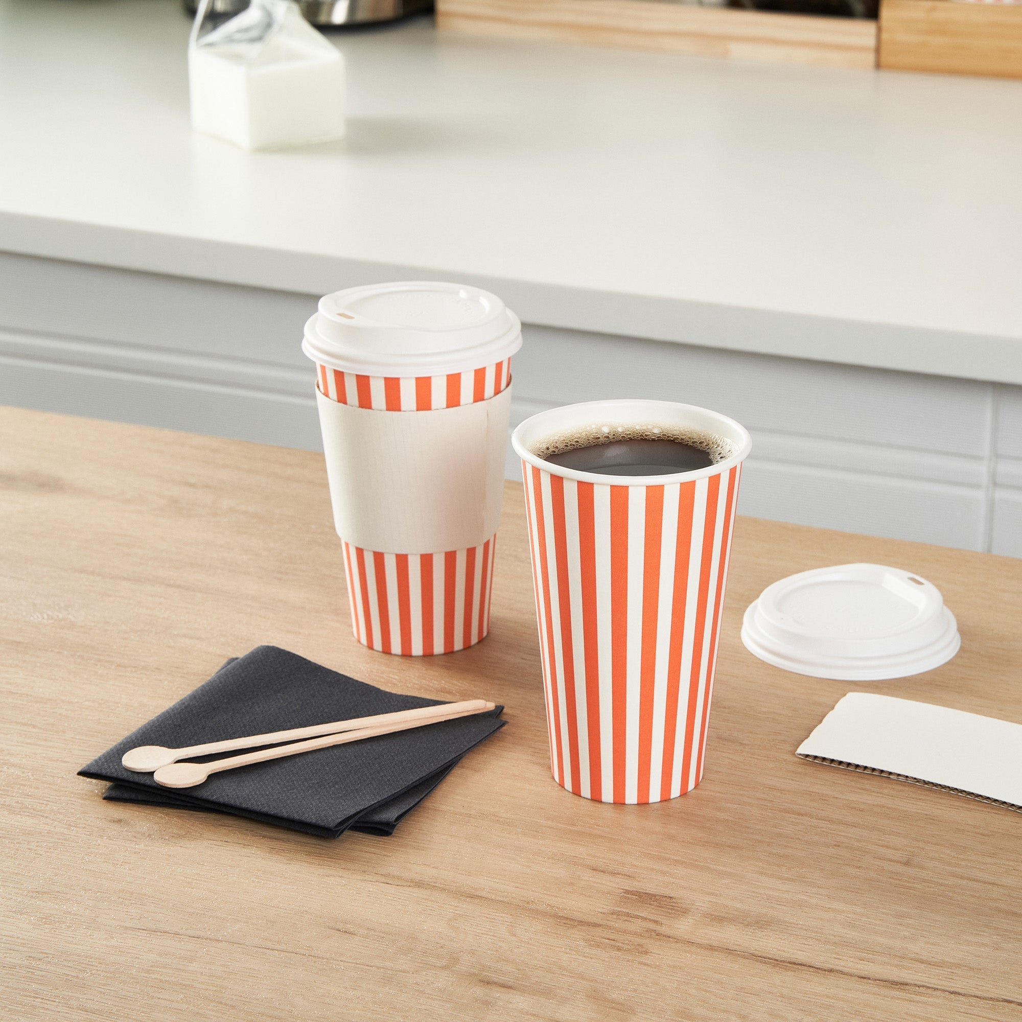 Restpresso 16 oz Orange and White Stripe Paper Single Wall Coffee Cup - with White Lid - 3 1/2"x 3 1/2"x 5 3/4" - 20 count box