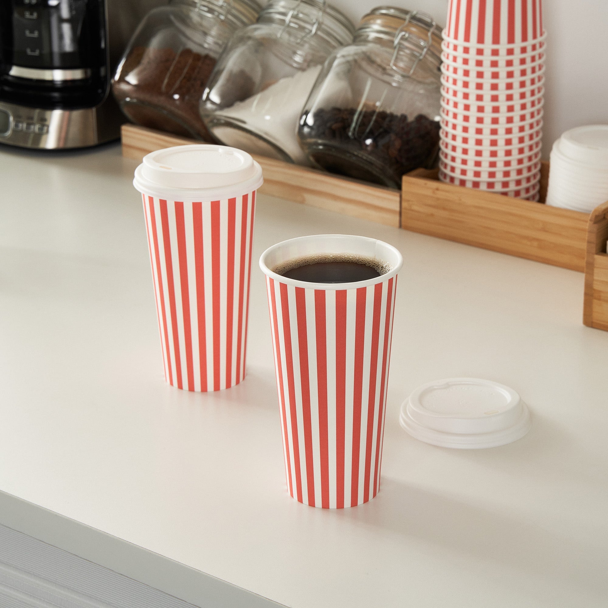 Restpresso 20 oz Red and White Stripe Paper Single Wall Coffee Cup - with White Lid - 3 1/2"x 3 1/2"x 6 1/2" - 20 count box