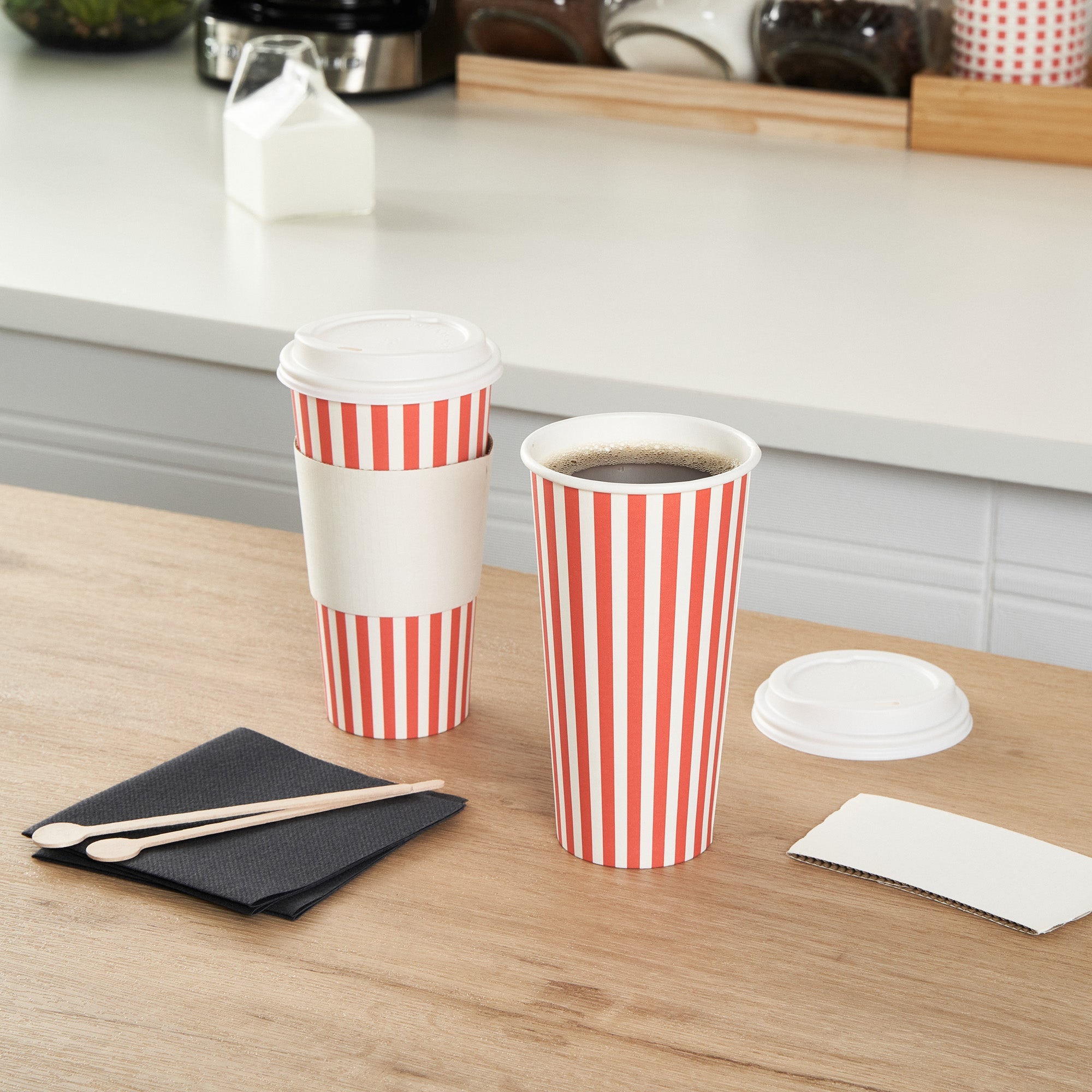 Restpresso 20 oz Red and White Stripe Paper Single Wall Coffee Cup - with White Lid - 3 1/2"x 3 1/2"x 6 1/2" - 20 count box
