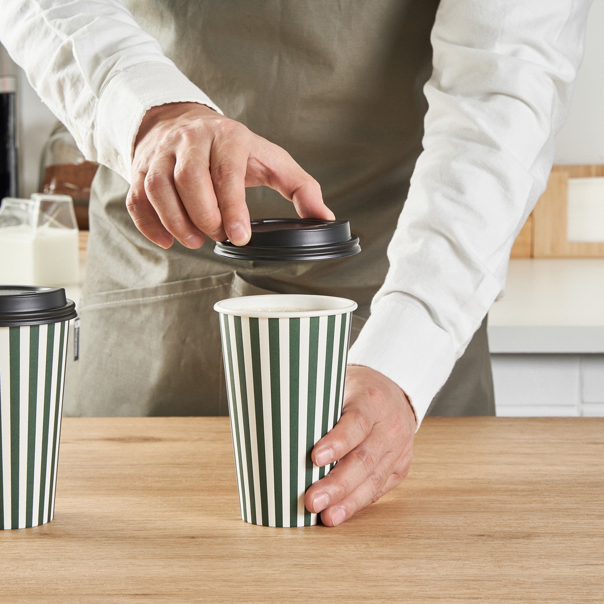Restpresso 16 oz Forest Green and White Stripe Paper Single Wall Coffee Cup - with Black Lid - 3 1/2"x 3 1/2"x 5 1/2" - 20 count box