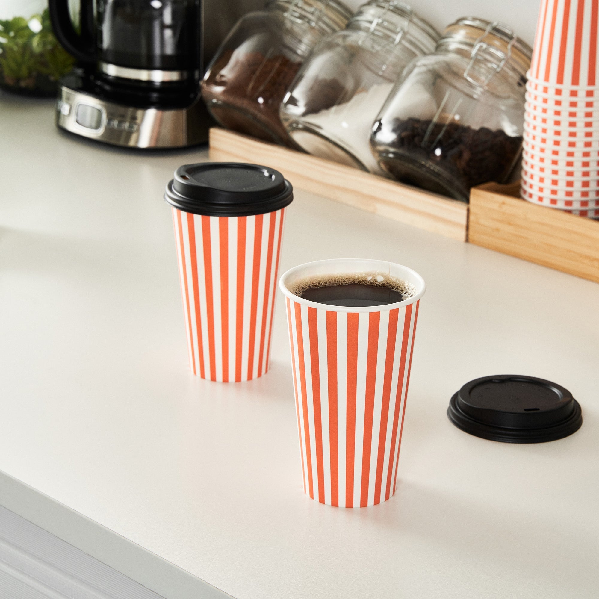 Restpresso 16 oz Orange and White Stripe Paper Single Wall Coffee Cup - with Black Lid - 3 1/2"x 3 1/2"x 5 1/2" - 20 count box