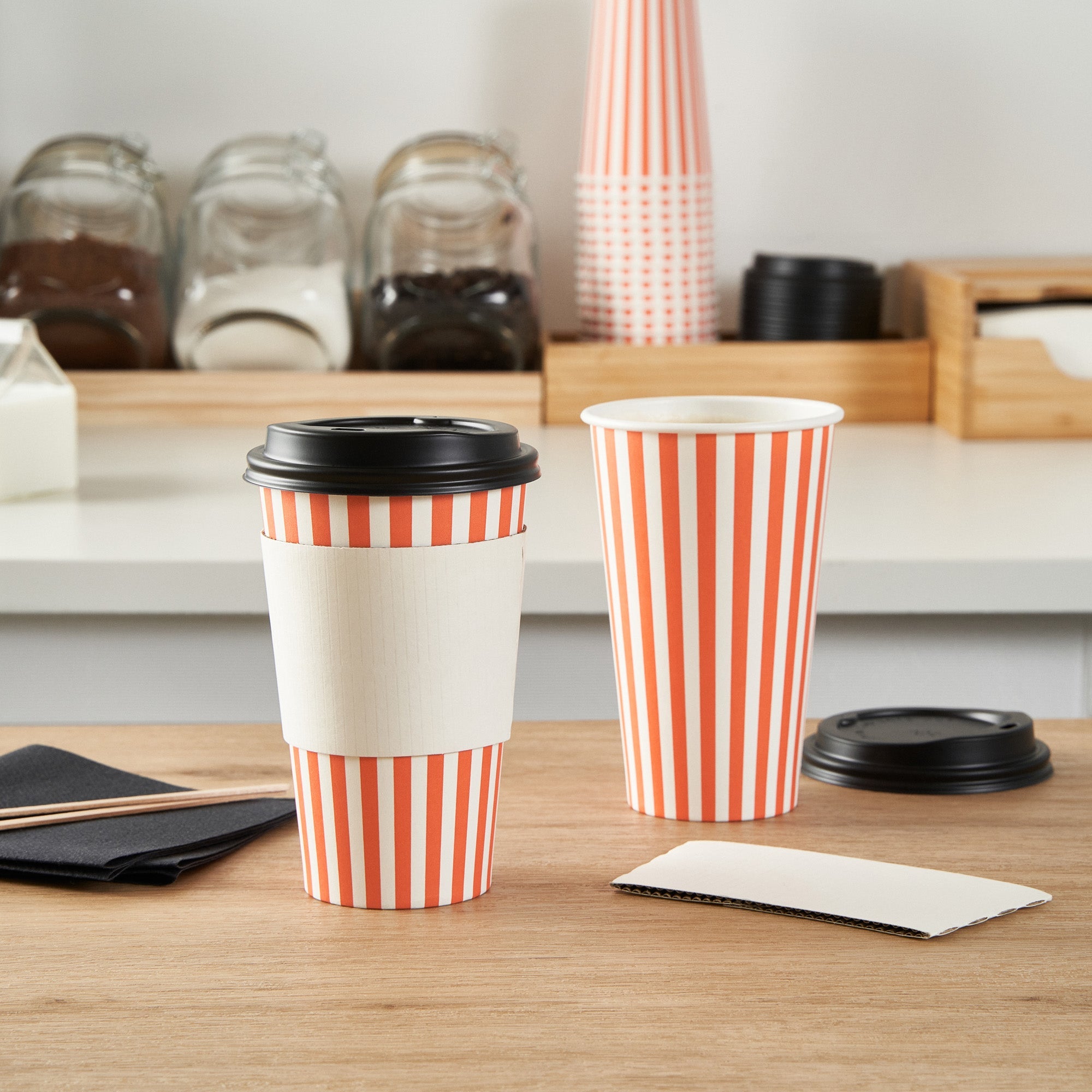 Restpresso 16 oz Orange and White Stripe Paper Single Wall Coffee Cup - with Black Lid - 3 1/2"x 3 1/2"x 5 1/2" - 20 count box