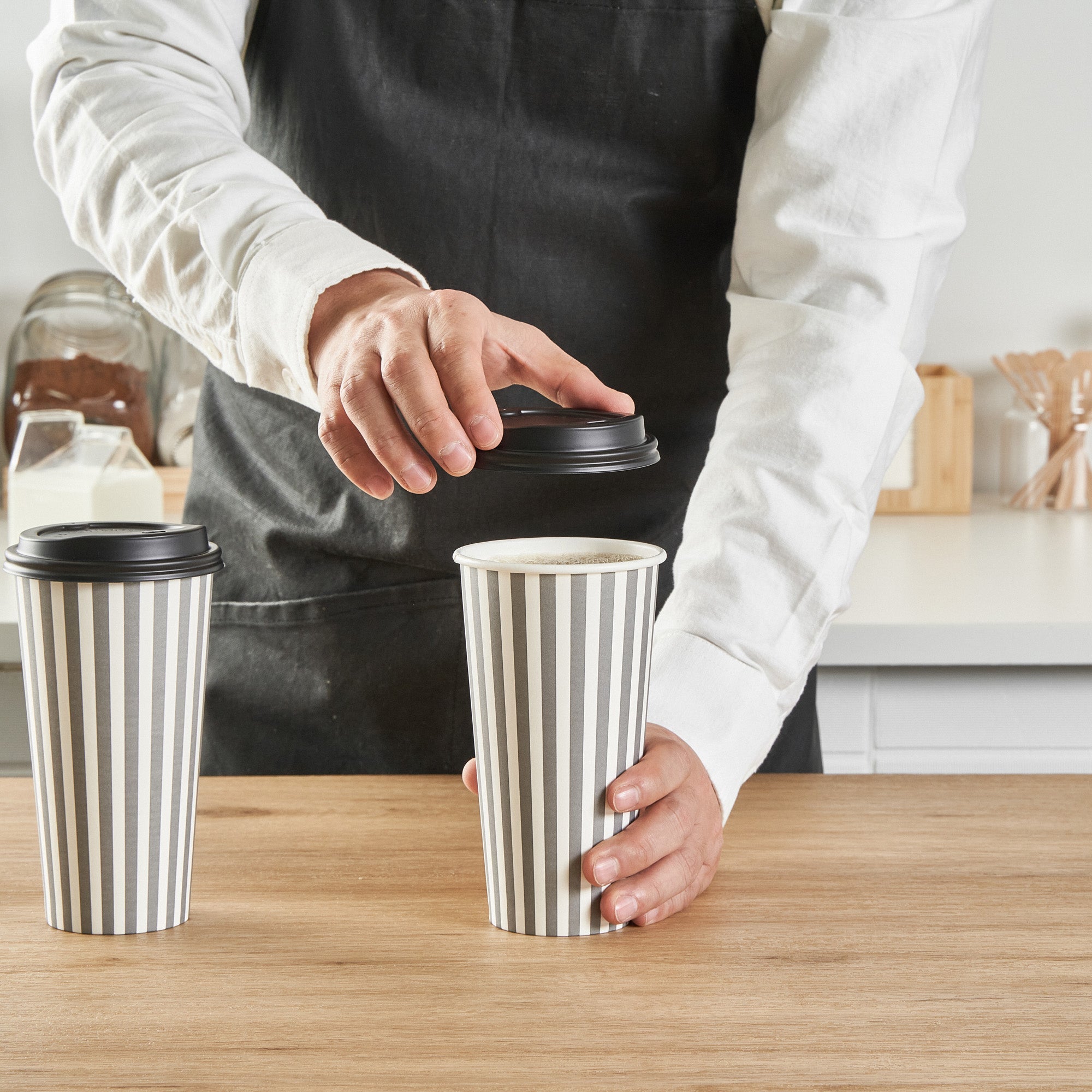 Restpresso 20 oz Gray and White Stripe Paper Single Wall Coffee Cup - with Black Lid - 3 1/2"x 3 1/2"x 6 1/4" - 400 count box