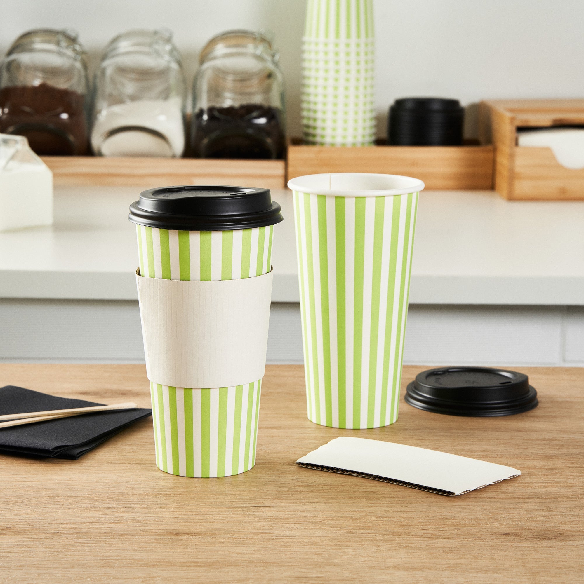 Restpresso 20 oz Green and White Stripe Paper Single Wall Coffee Cup - with Black Lid - 3 1/2"x 3 1/2"x 6 1/4" - 400 count box