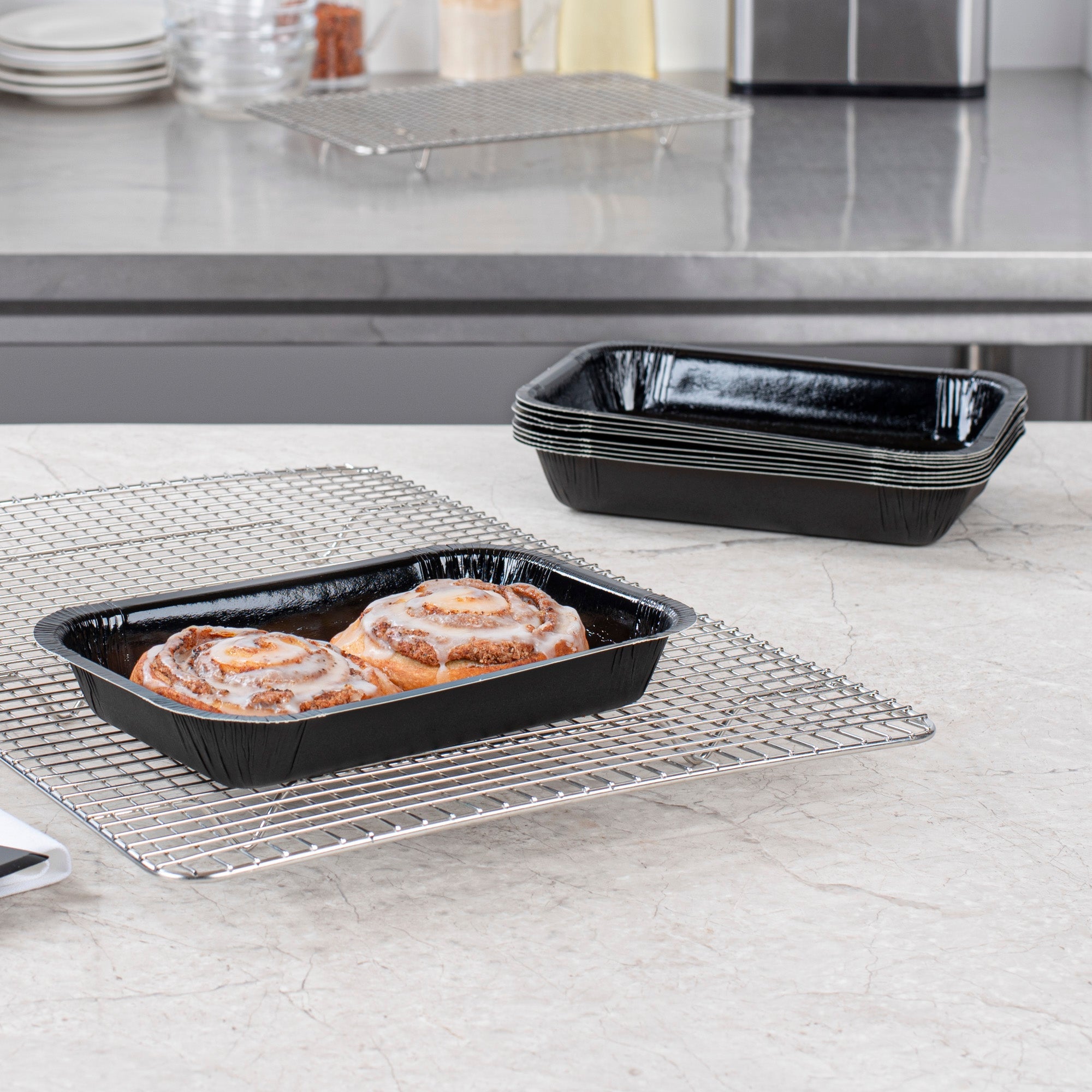 Pastry Tek 24 oz Rectangle Black Paperboard Tray - Oven-Safe - 8 1/4" x 5 1/2" x 1 1/2" - 25 count box