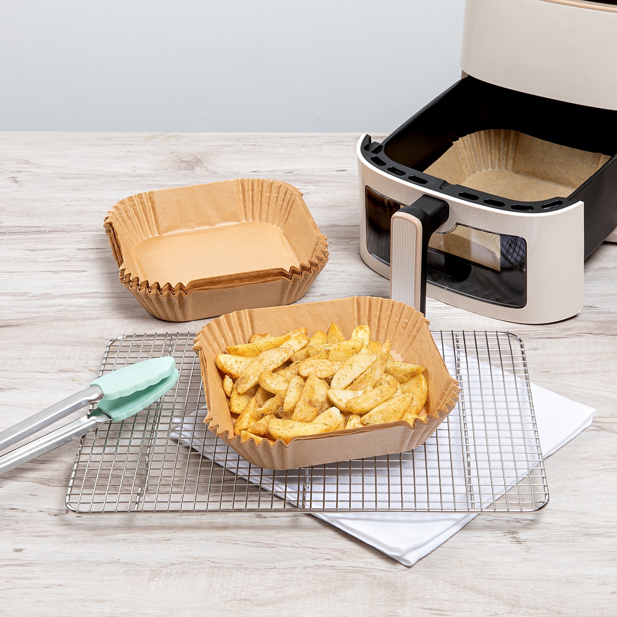 Pastry Tek Square Unbleached Air Fryer Liner / Parchment Paper - Silicone Coated - 6 1/4" x 6 1/4" x 1 3/4" - 100 count box