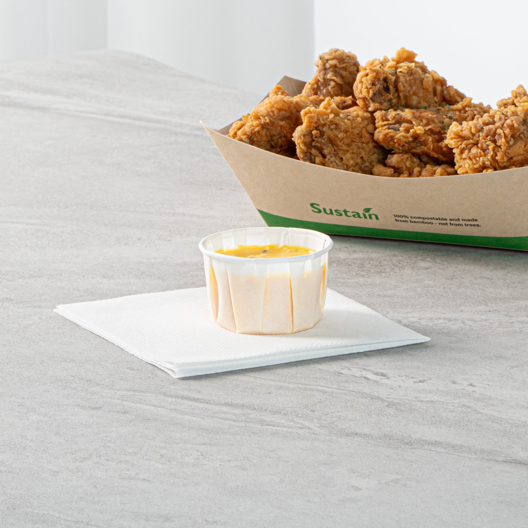 Sustain 2 oz White Paper Portion Cup - Compostable - 100 count box