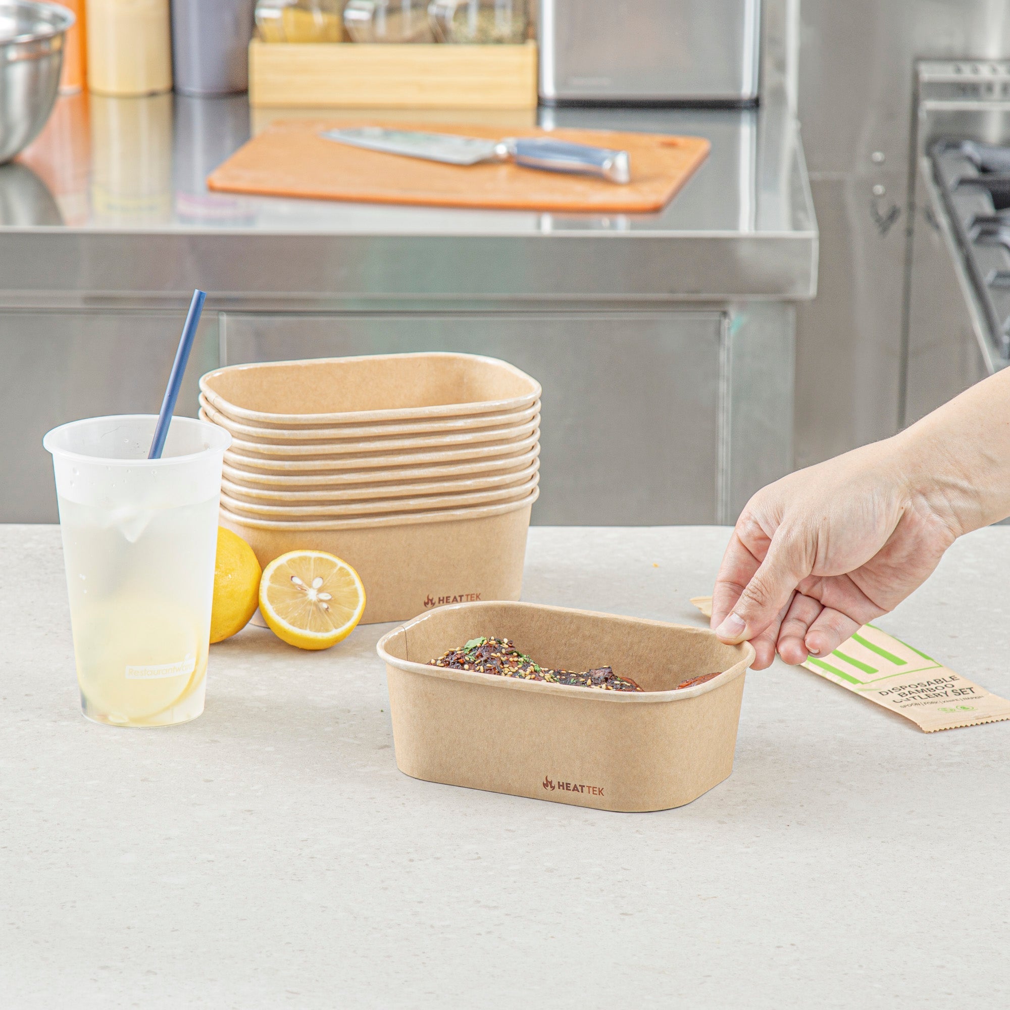 Heat Tek 25 oz Oval Kraft Paper Serving Container - Oven-Safe - 6 3/4" x 4 3/4" x 2 1/4" -100 count box