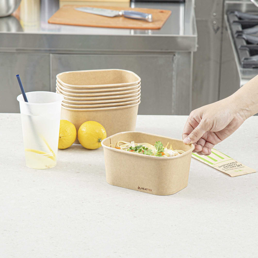 Heat Tek 34 oz Oval Kraft Paper Serving Container - Oven-Safe - 6 3/4" x 4 3/4" x 3" - 25 count box