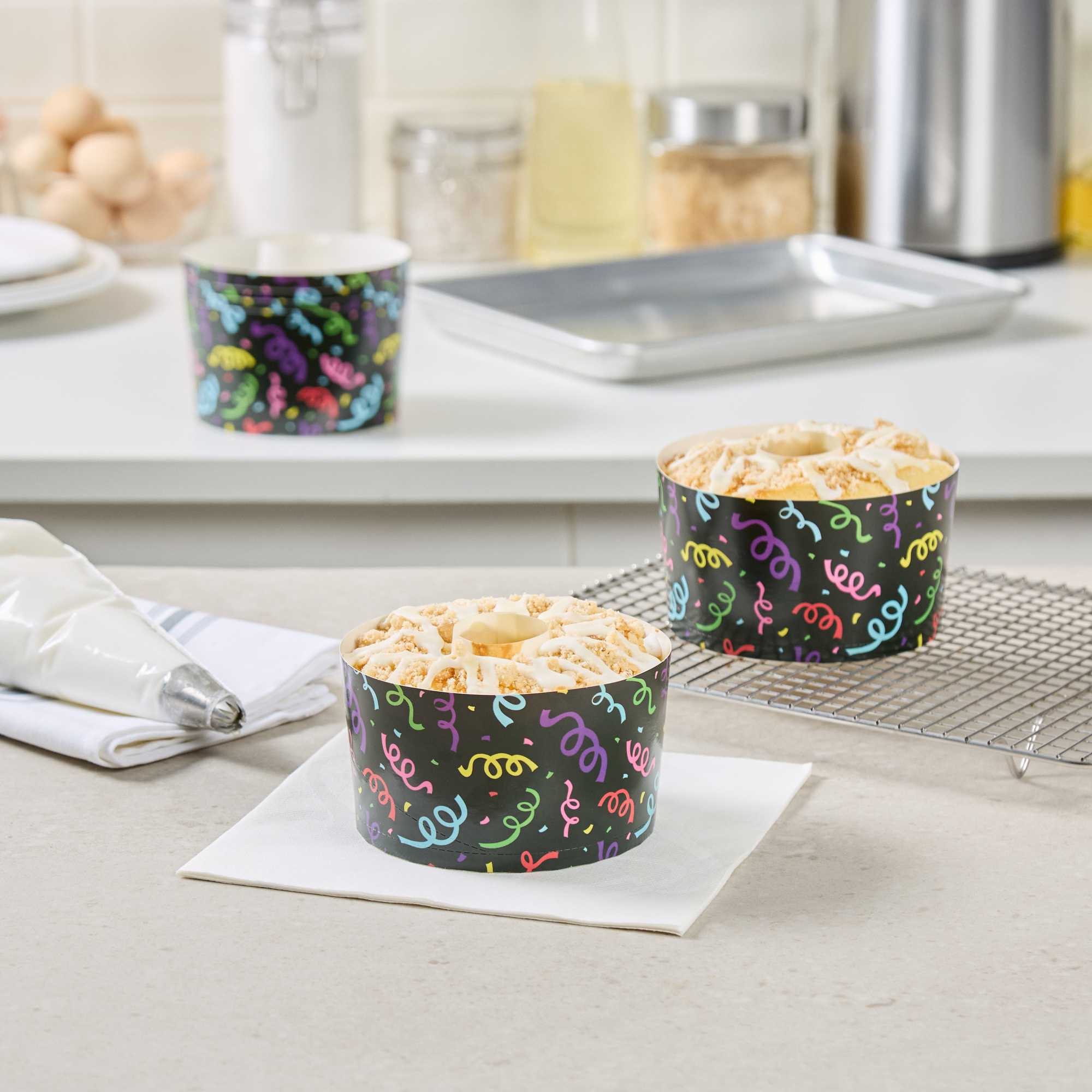 Panificio 22 oz Paper Angel Food Tube Pan - Colorful Streamers, Greaseproof - 4 1/2" x 4 1/2" x 2 3/4" - 100 count box