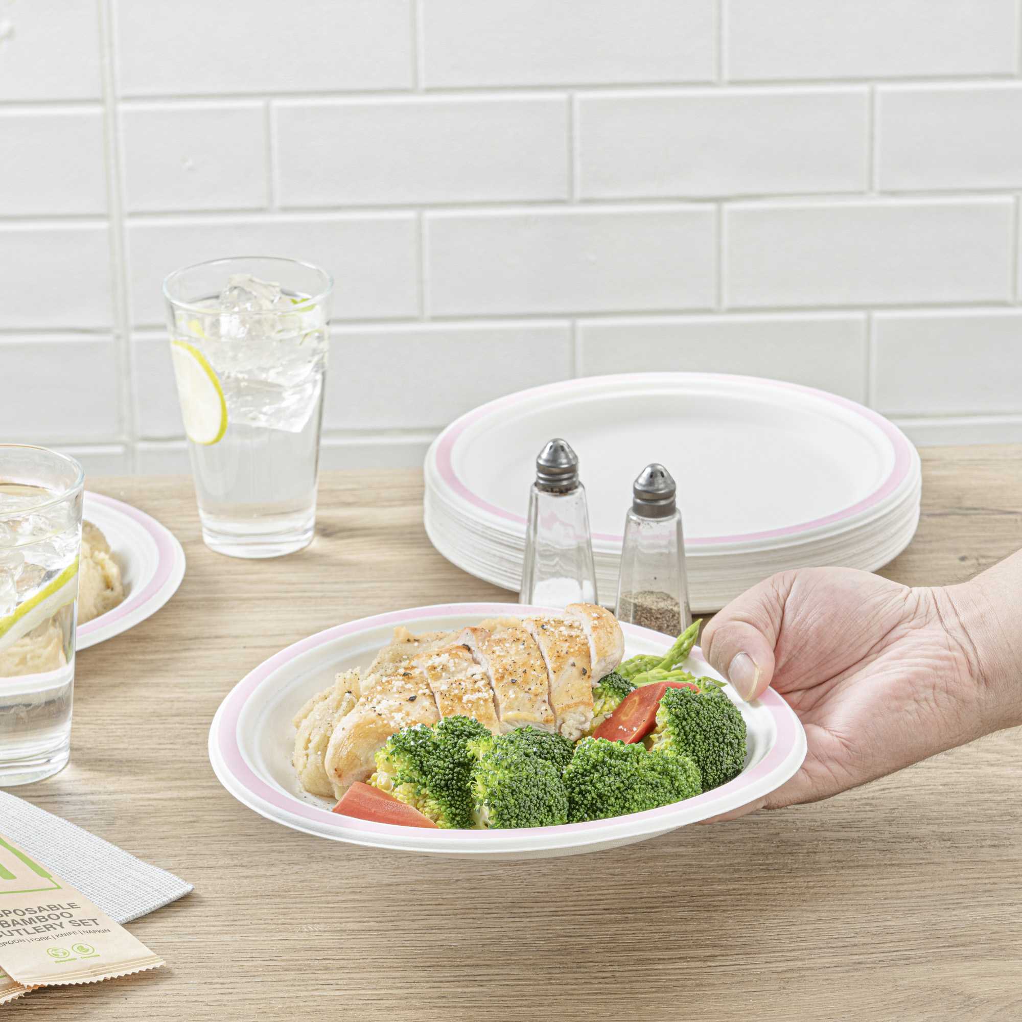 Pulp Safe No PFAS Added Round White Sugarcane / Bagasse Plate - Home Compostable, with Pink Rim - 8 3/4" x 8 3/4" - 100 count box