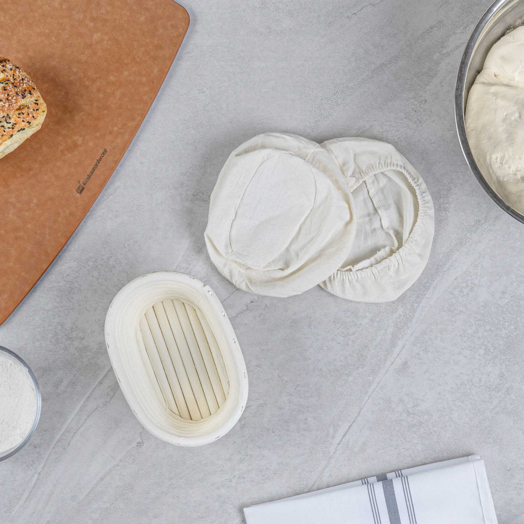 Pastry Tek Rattan Oval Natural Banneton Proofing Basket - with 2 Cotton Liners - 6 3/4" x 4 3/4" x 3 1/4" - 1 count box