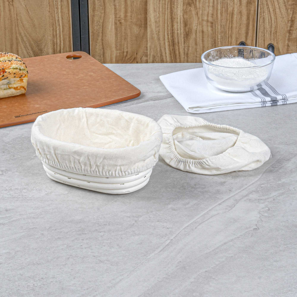 Pastry Tek Rattan Oval Natural Banneton Proofing Basket - with 2 Cotton Liners - 6 3/4" x 4 3/4" x 3 1/4" - 10 count box