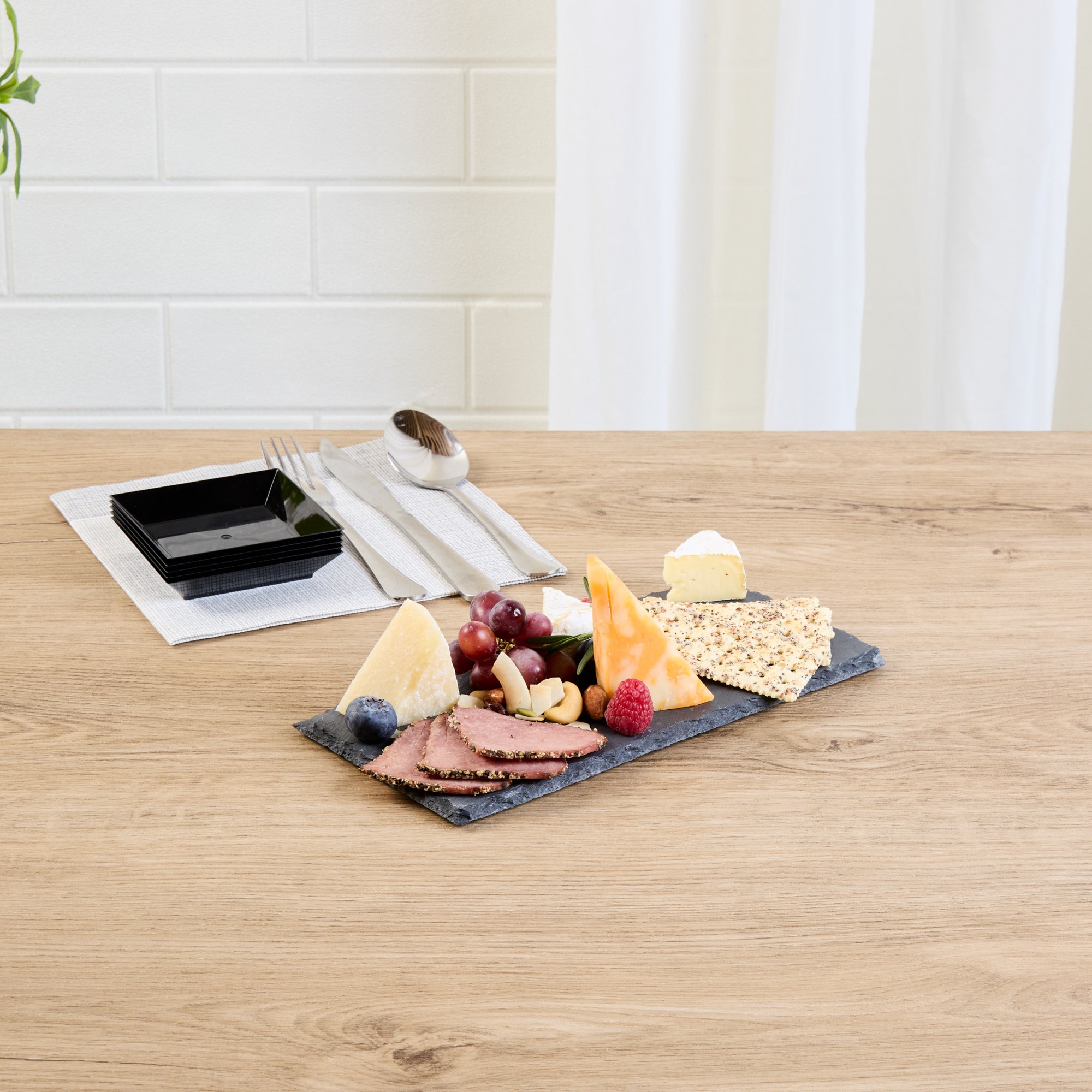Stone Tek Rectangle Black Slate Serving Plate - 9 3/4" x 4 3/4" - 4 count box