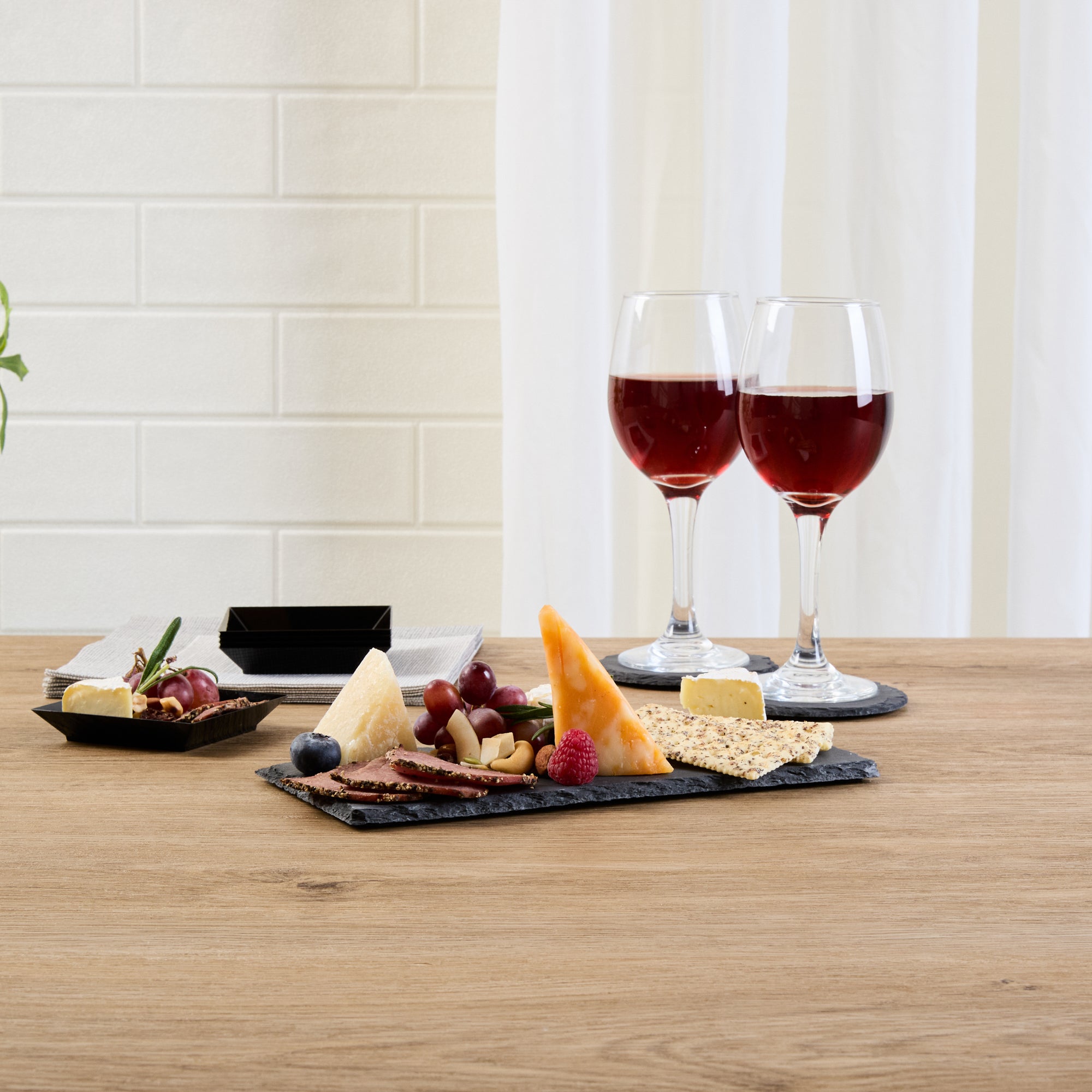 Stone Tek Rectangle Black Slate Serving Plate - 9 3/4" x 4 3/4" - 4 count box