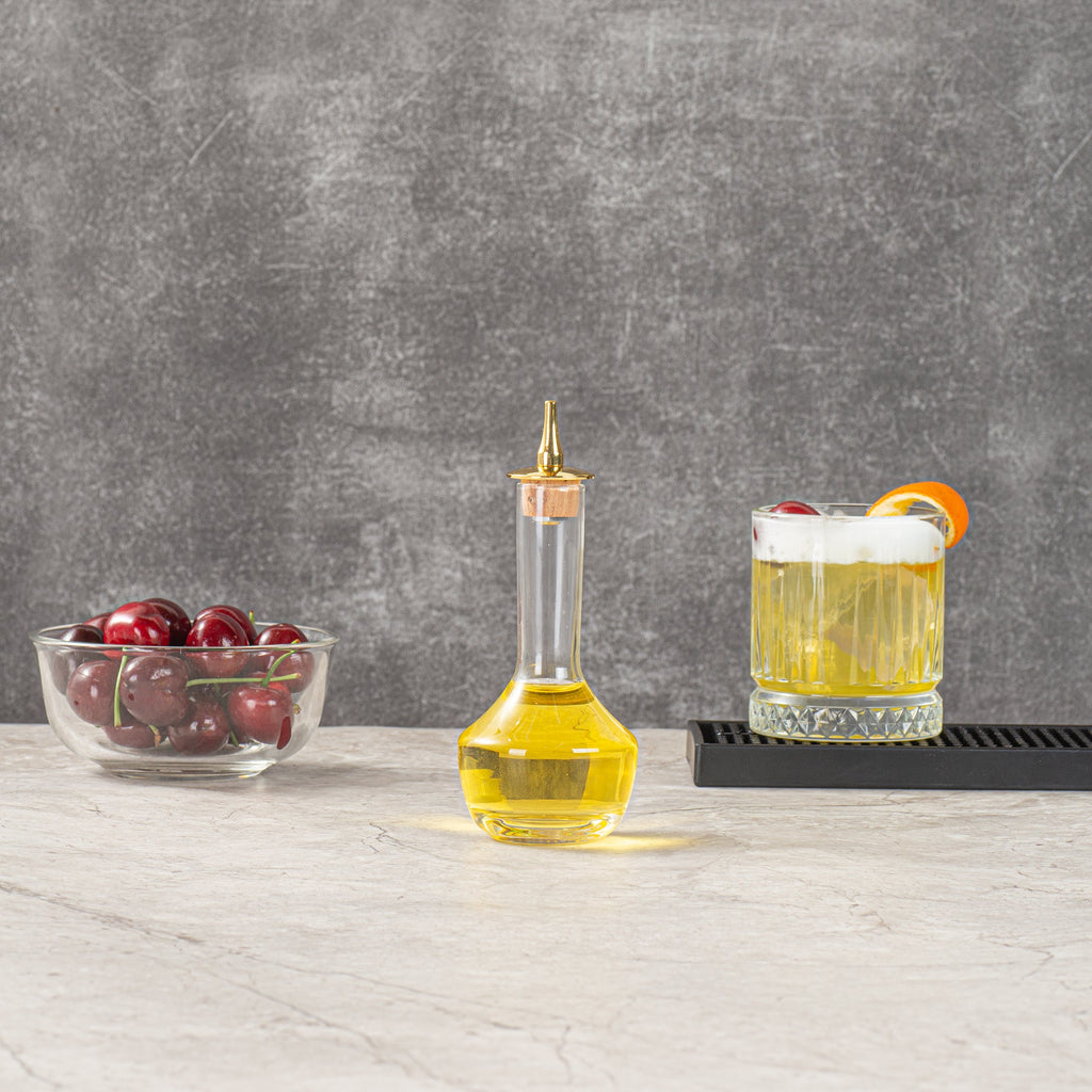 Bar Lux 4 oz Glass Modern Style Bitters Bottle - Gold-Plated Dasher - 5 3/4" x 2 3/4" x 2 3/4" - 1 count box