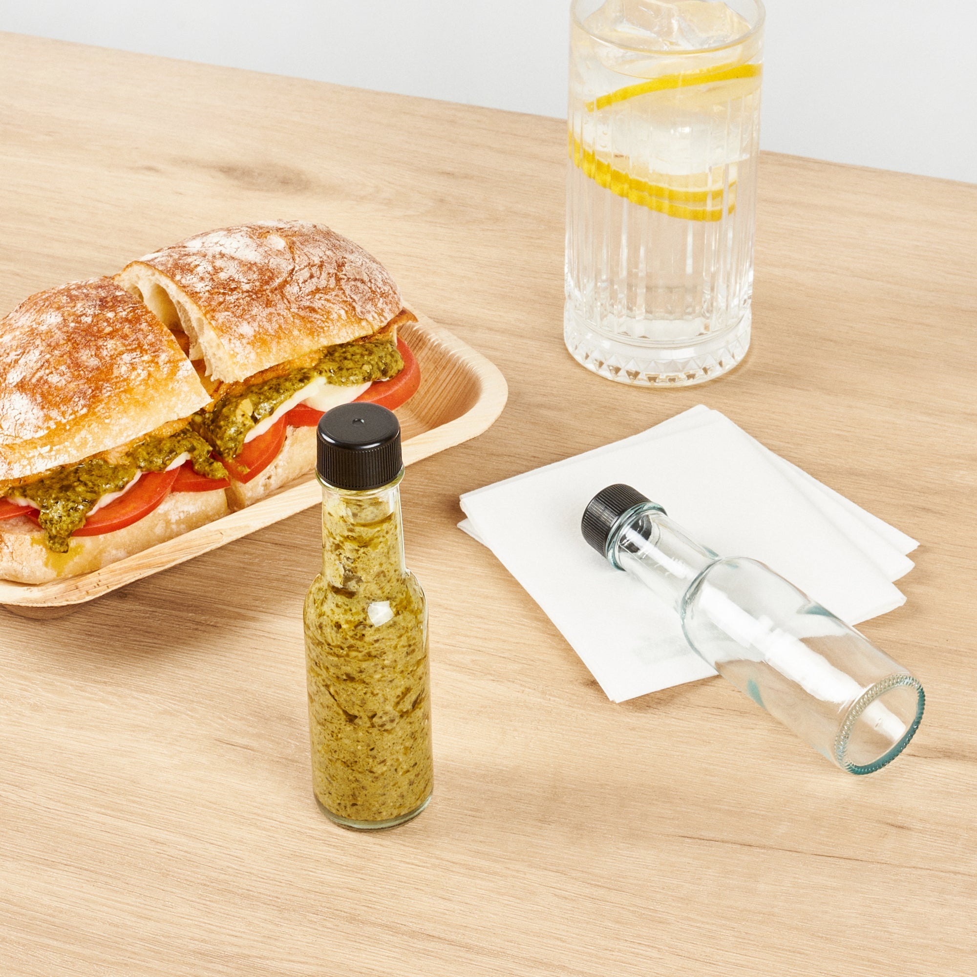 Vetri 3 oz Glass Woozy Bottle - with Black Cap - 1 1/2" x 1 1/2" x 6" - 10 count box