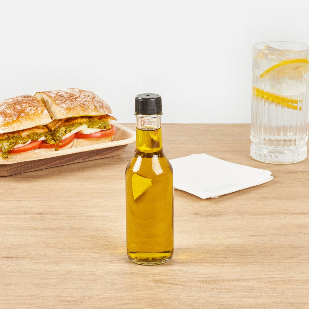 Vetri 5 oz Glass Woozy Bottle - with Black Cap - 1 3/4" x 1 3/4" x 6 3/4" - 10 count box